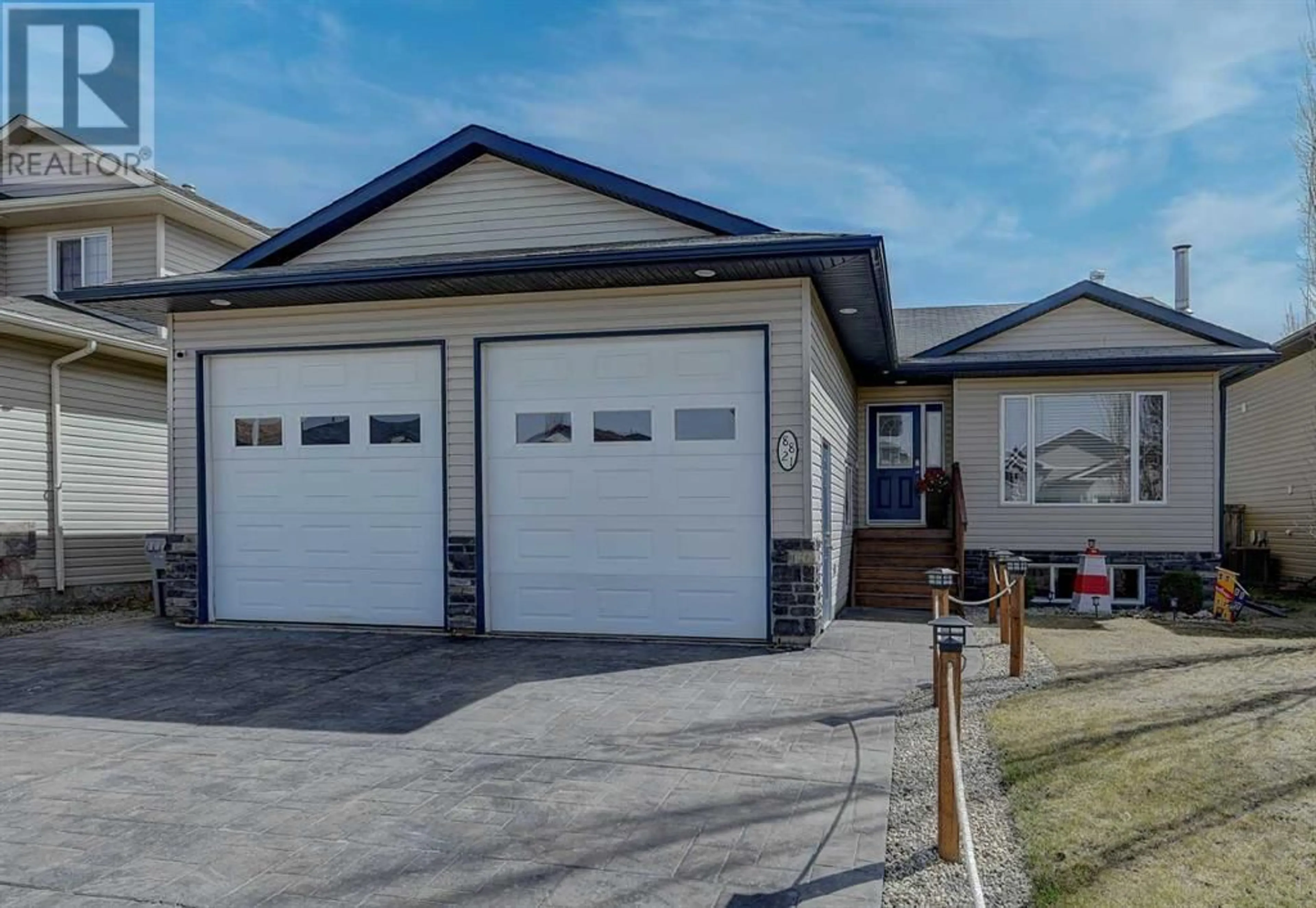 Frontside or backside of a home for 8821 114 Avenue, Grande Prairie Alberta T8X0A5