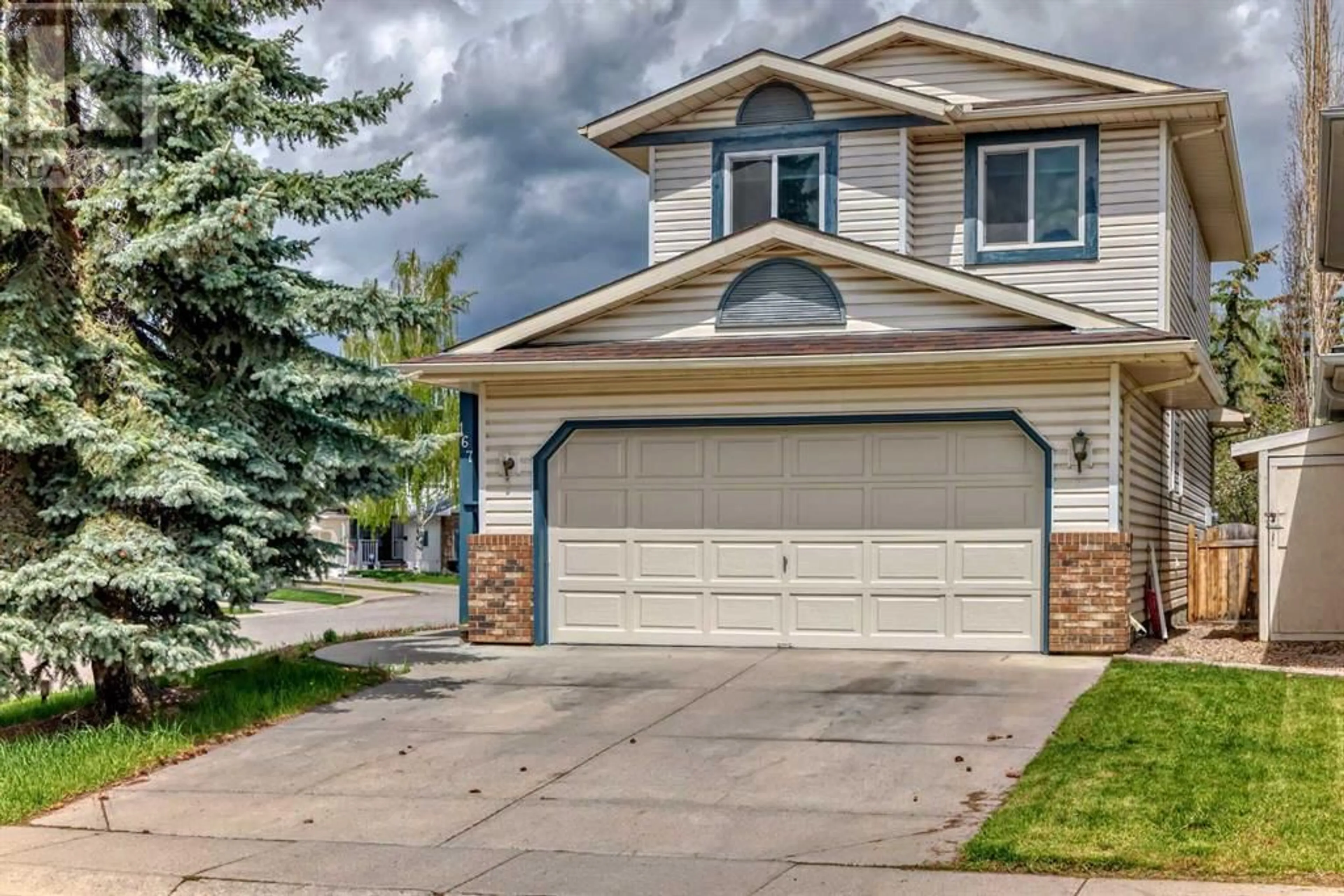 A pic from exterior of the house or condo for 167 River Rock Crescent SE, Calgary Alberta T2C4J2