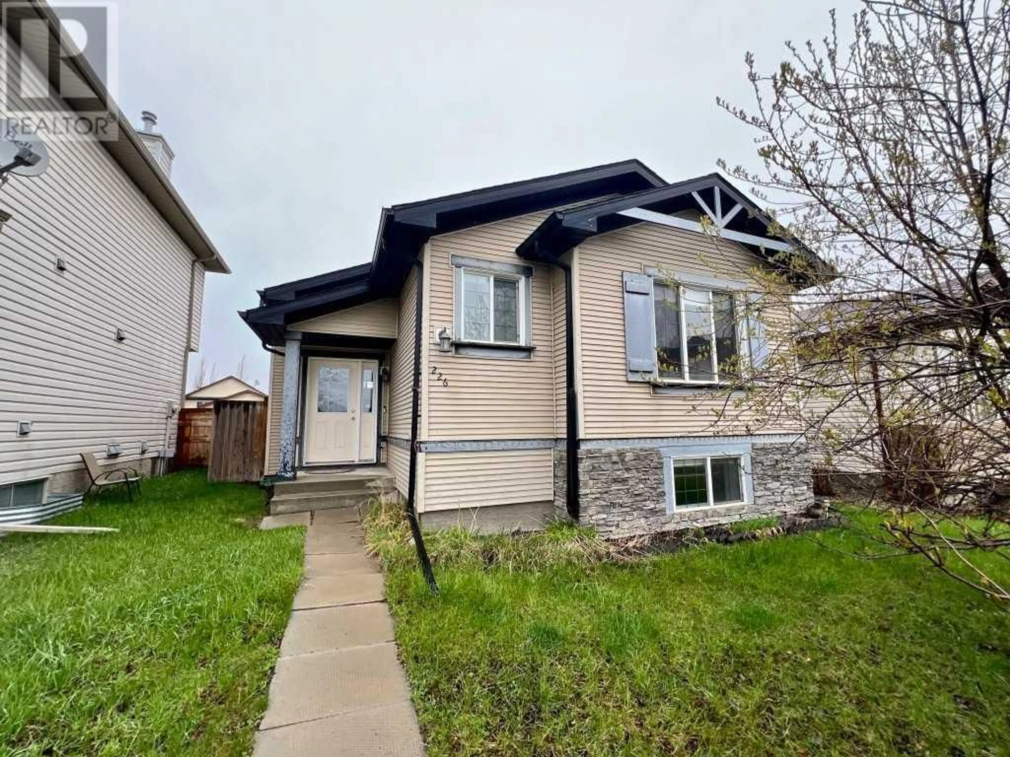 Frontside or backside of a home for 226 Cimarron Boulevard, Okotoks Alberta T1S2E5