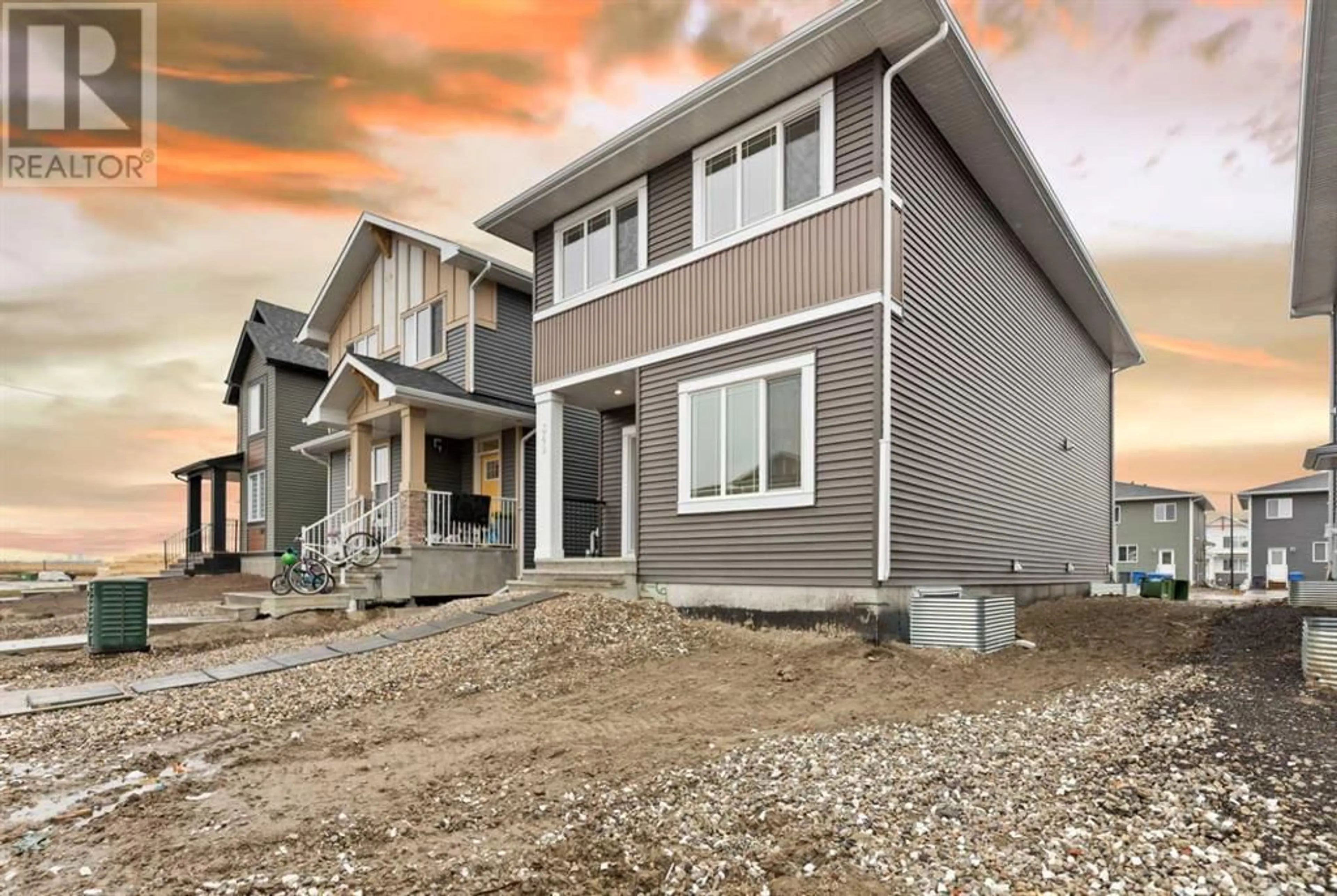 Frontside or backside of a home for 349 Chelsea Hollow, Chestermere Alberta T1X2T3