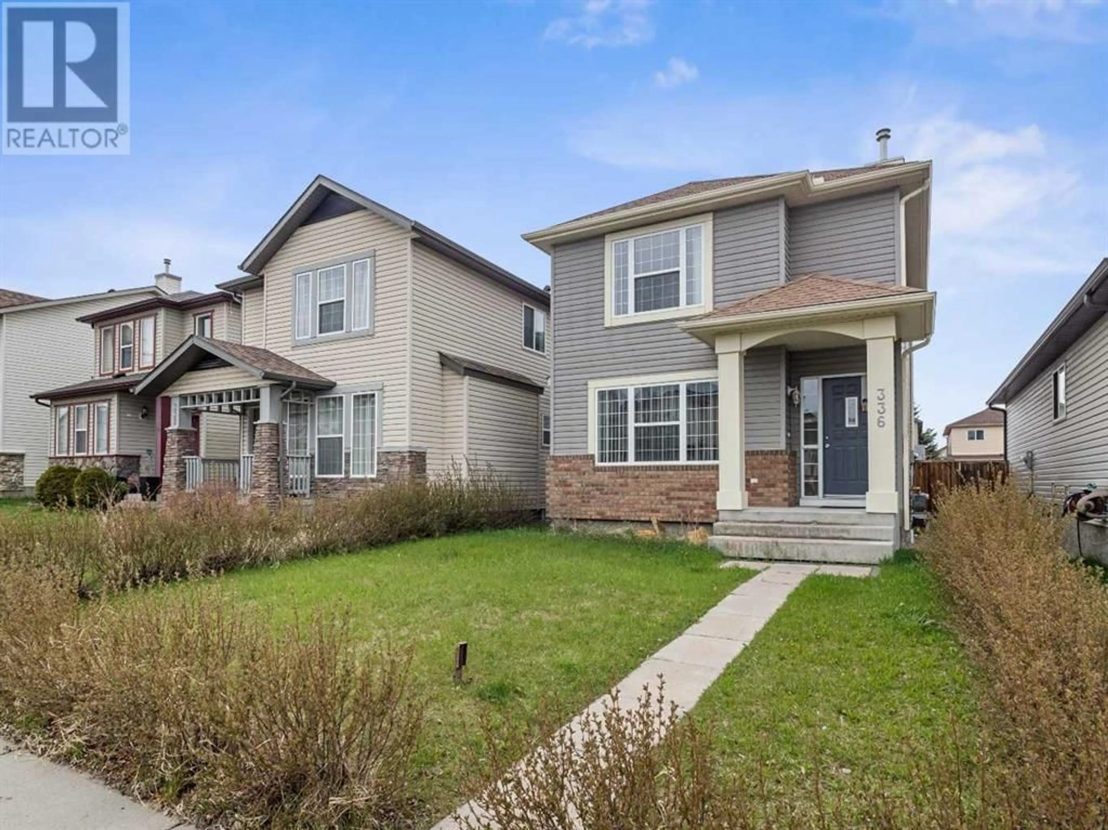 Frontside or backside of a home for 336 Eversyde Circle SW, Calgary Alberta T2Y4T2
