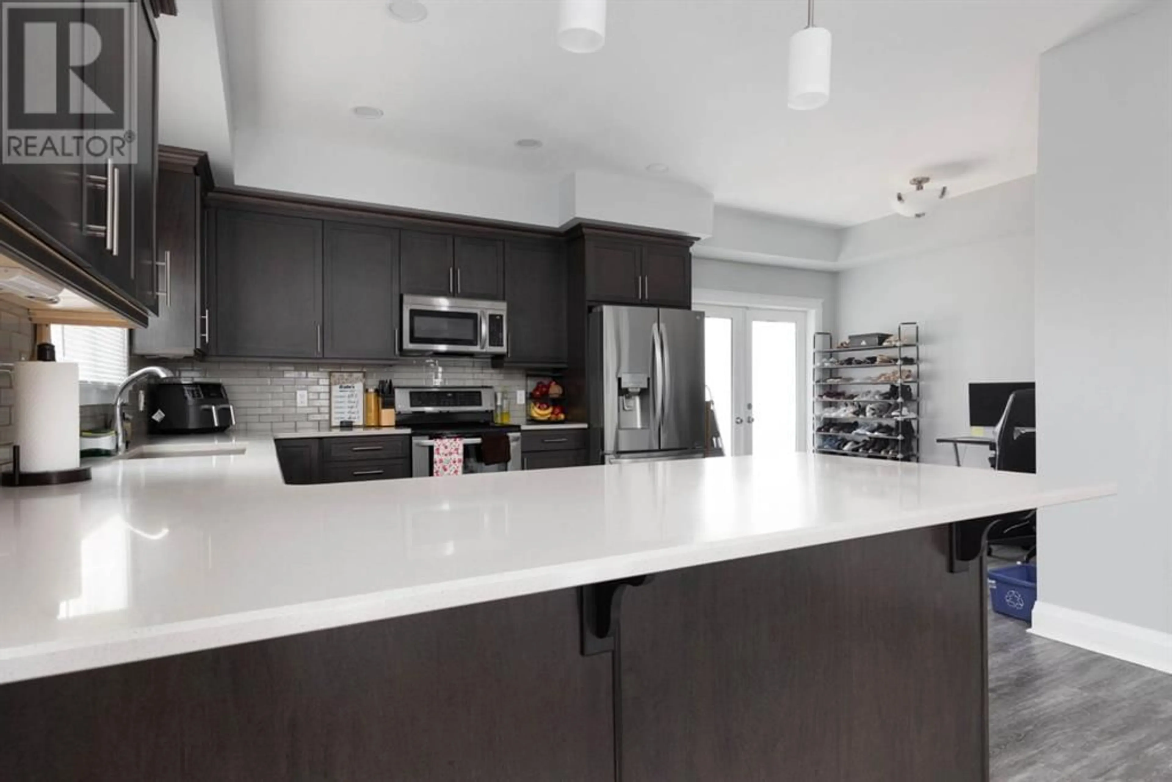 Contemporary kitchen for 224 Siltstone Place, Fort McMurray Alberta T9K0W5