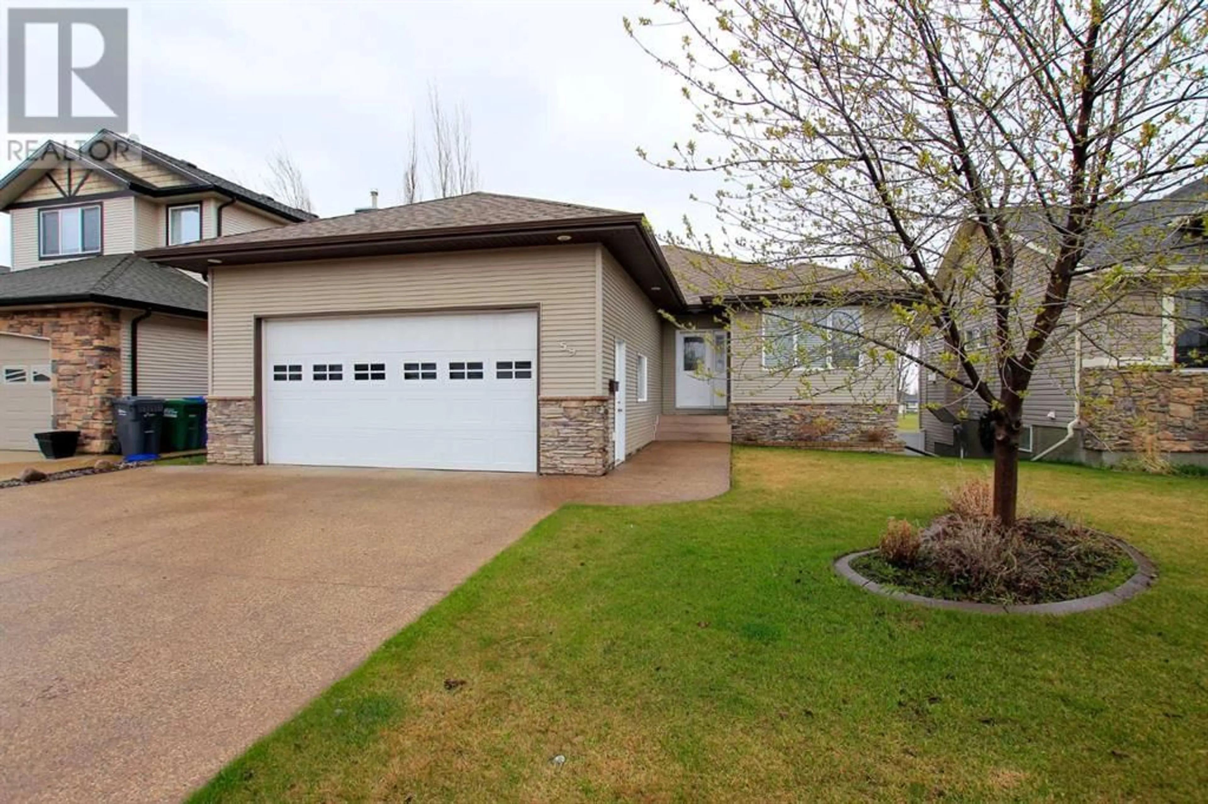 Frontside or backside of a home for 59 Irving Crescent, Red Deer Alberta T4R3S2