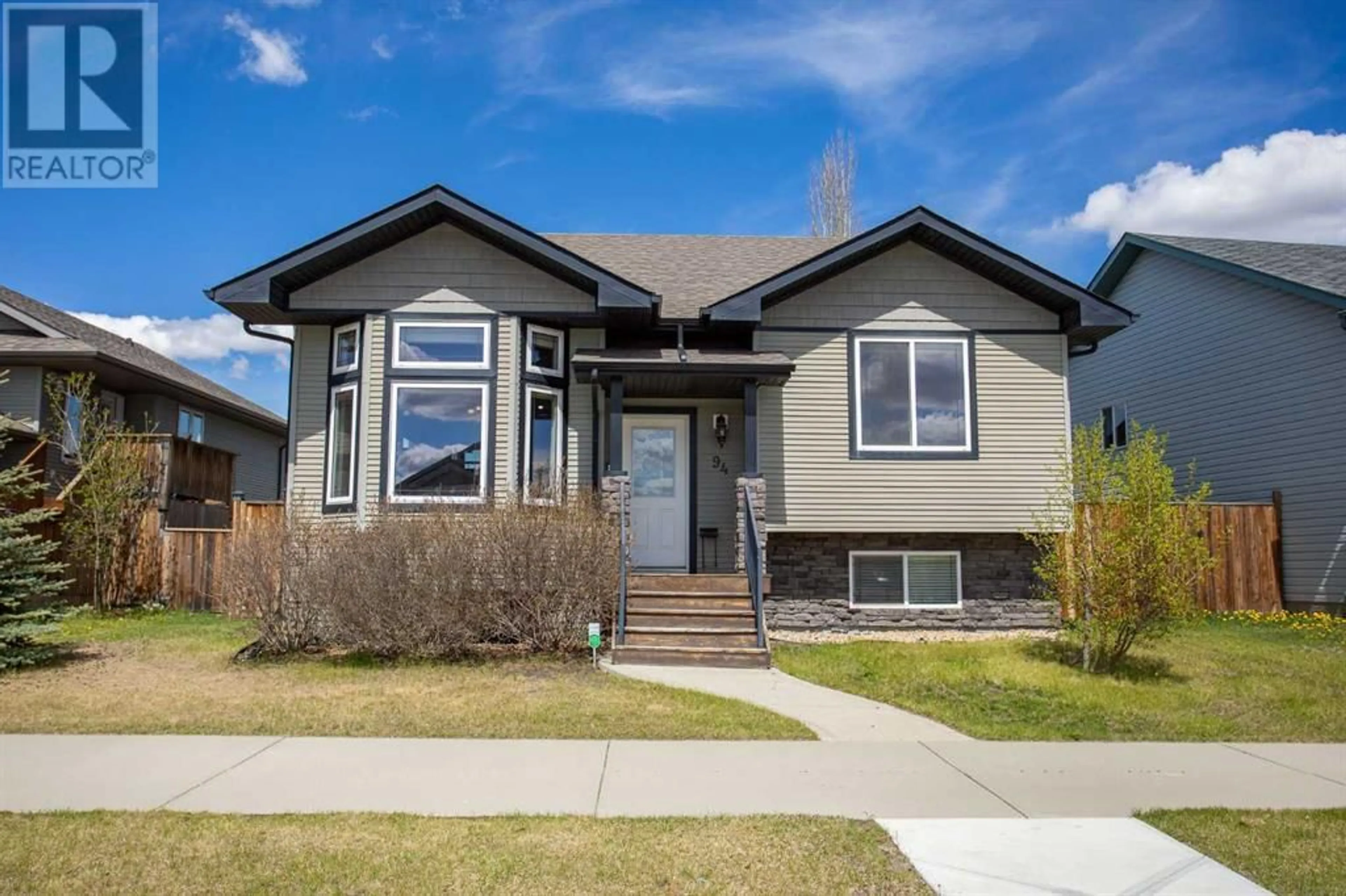 Frontside or backside of a home for 94 Vanier Drive, Red Deer Alberta T4R0E1