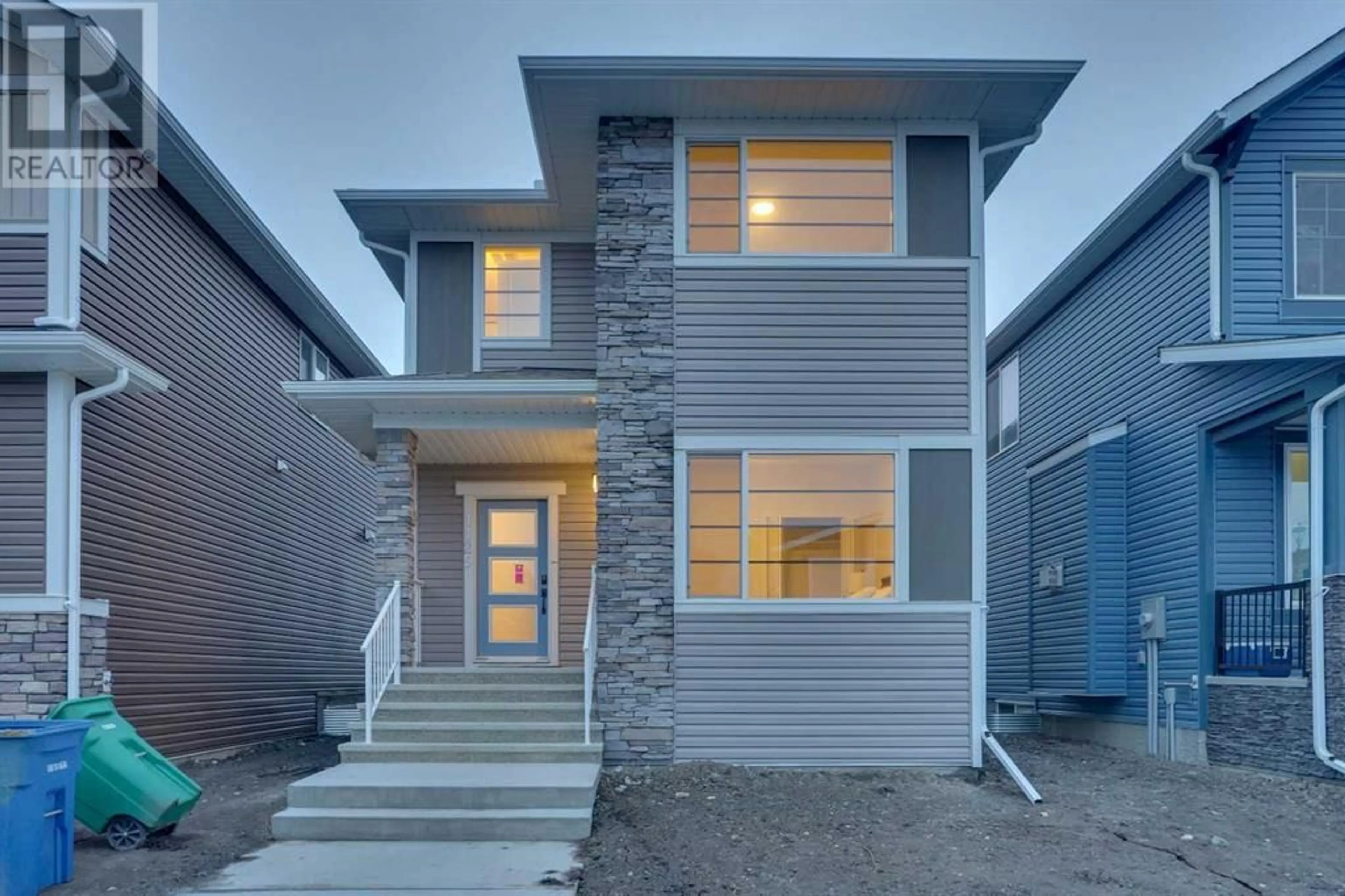 Frontside or backside of a home for 1125 Bayview Gardens SW, Airdrie Alberta T4B5K3