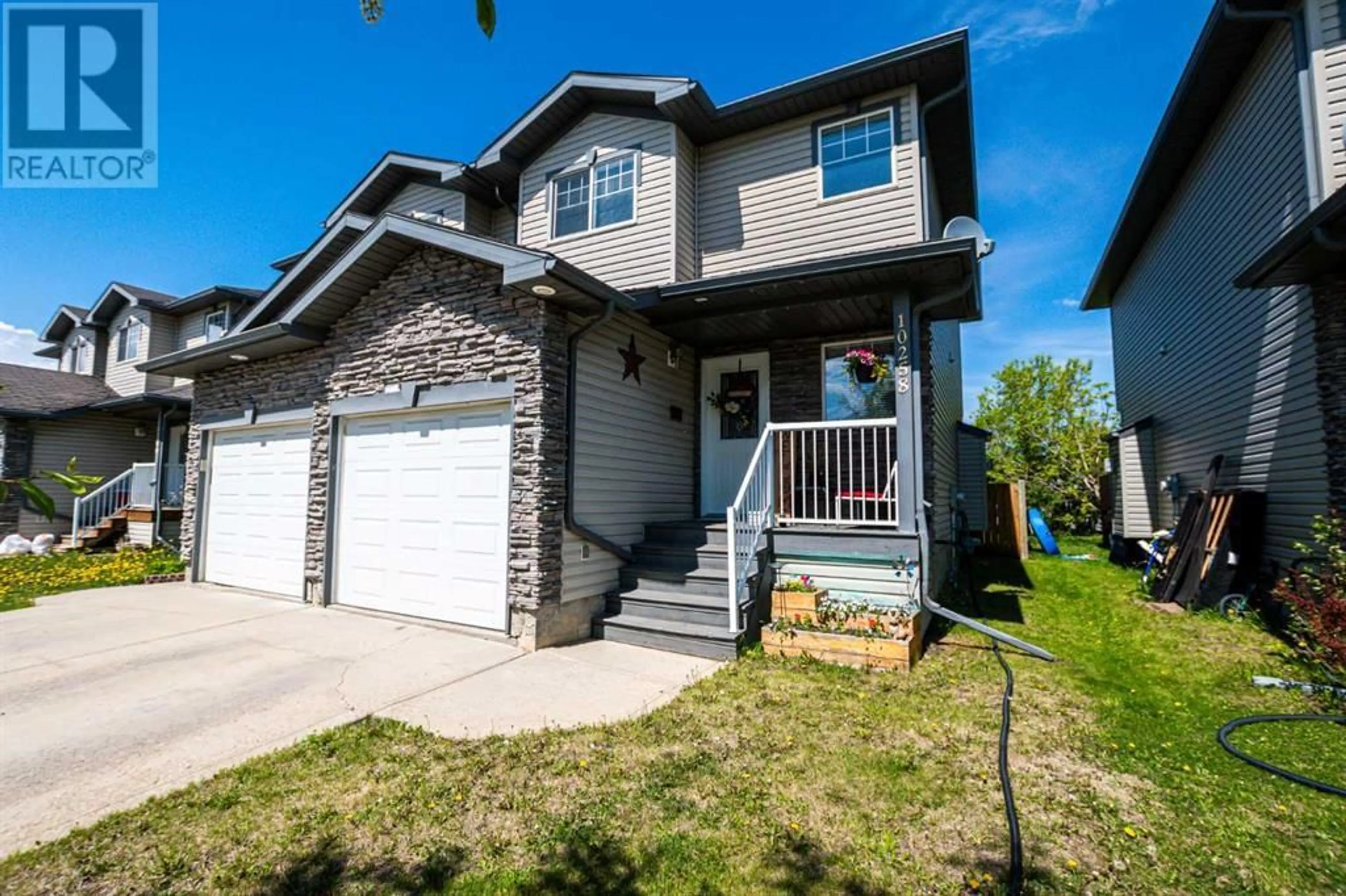 A pic from exterior of the house or condo for 10258 70 Avenue, Grande Prairie Alberta T8W2Y5