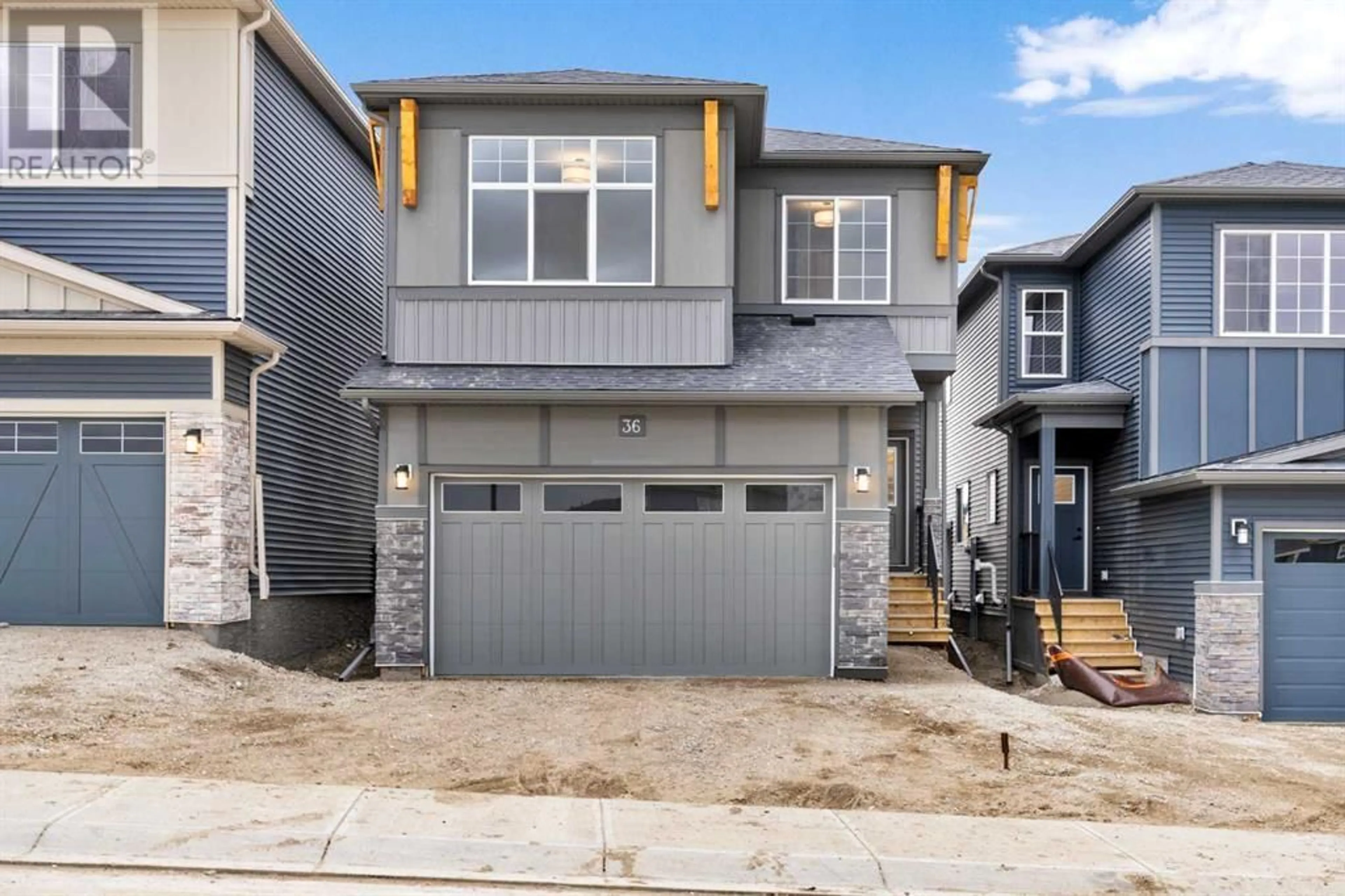 Frontside or backside of a home for 36 Carringvue Passage NW, Calgary Alberta T3P2G5