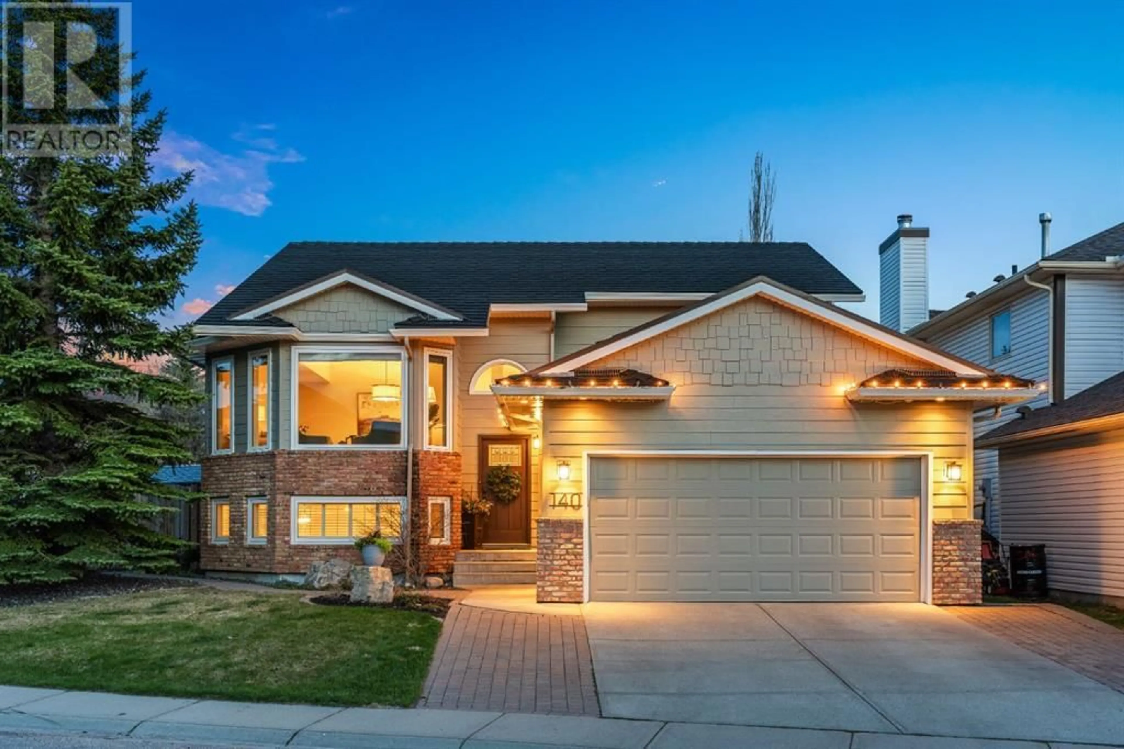 Frontside or backside of a home for 140 Edgebrook Circle NW, Calgary Alberta T3A5A3