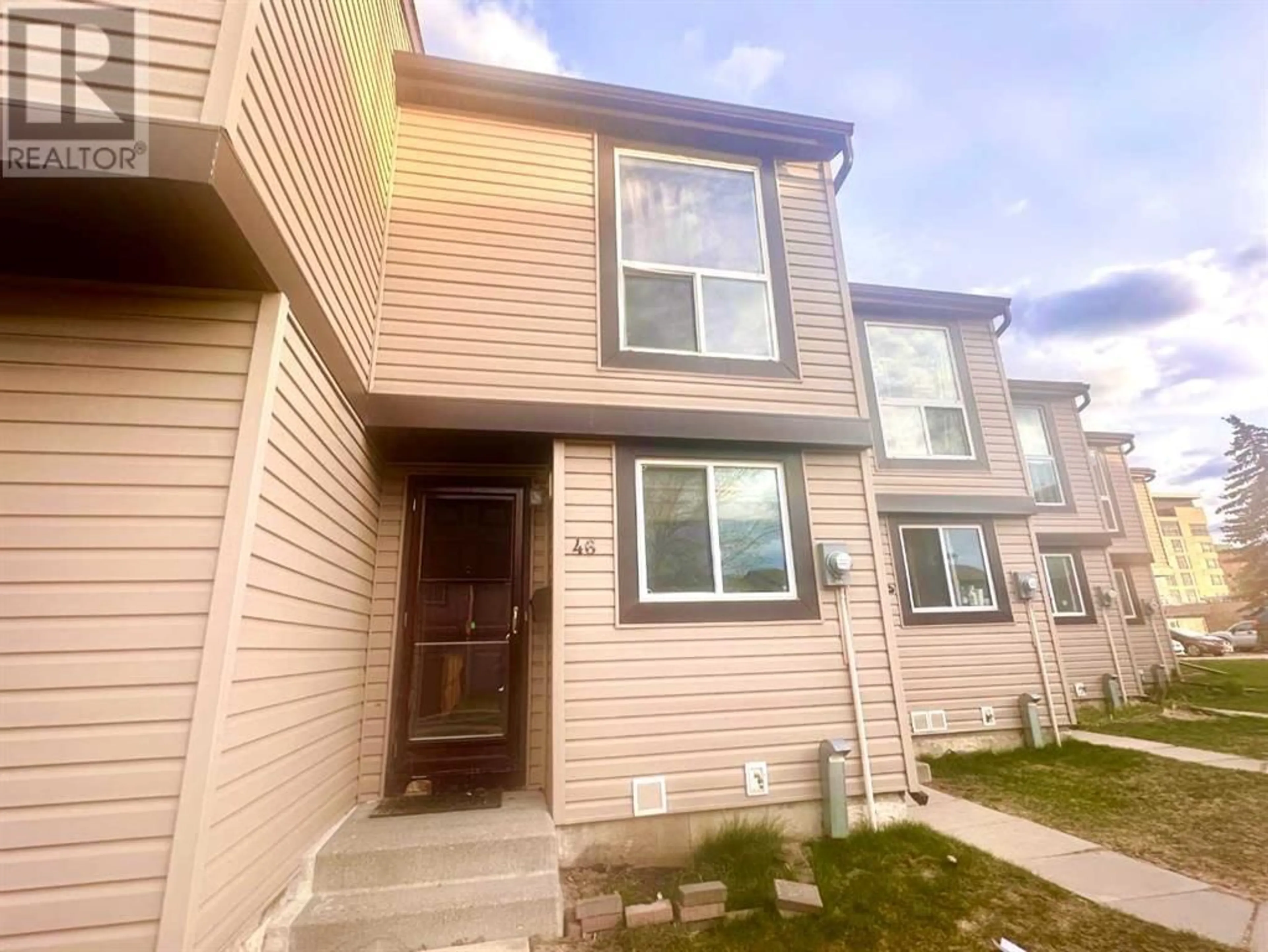 A pic from exterior of the house or condo for 46 3029 RUNDLESON Road NE, Calgary Alberta T1Y3Z5