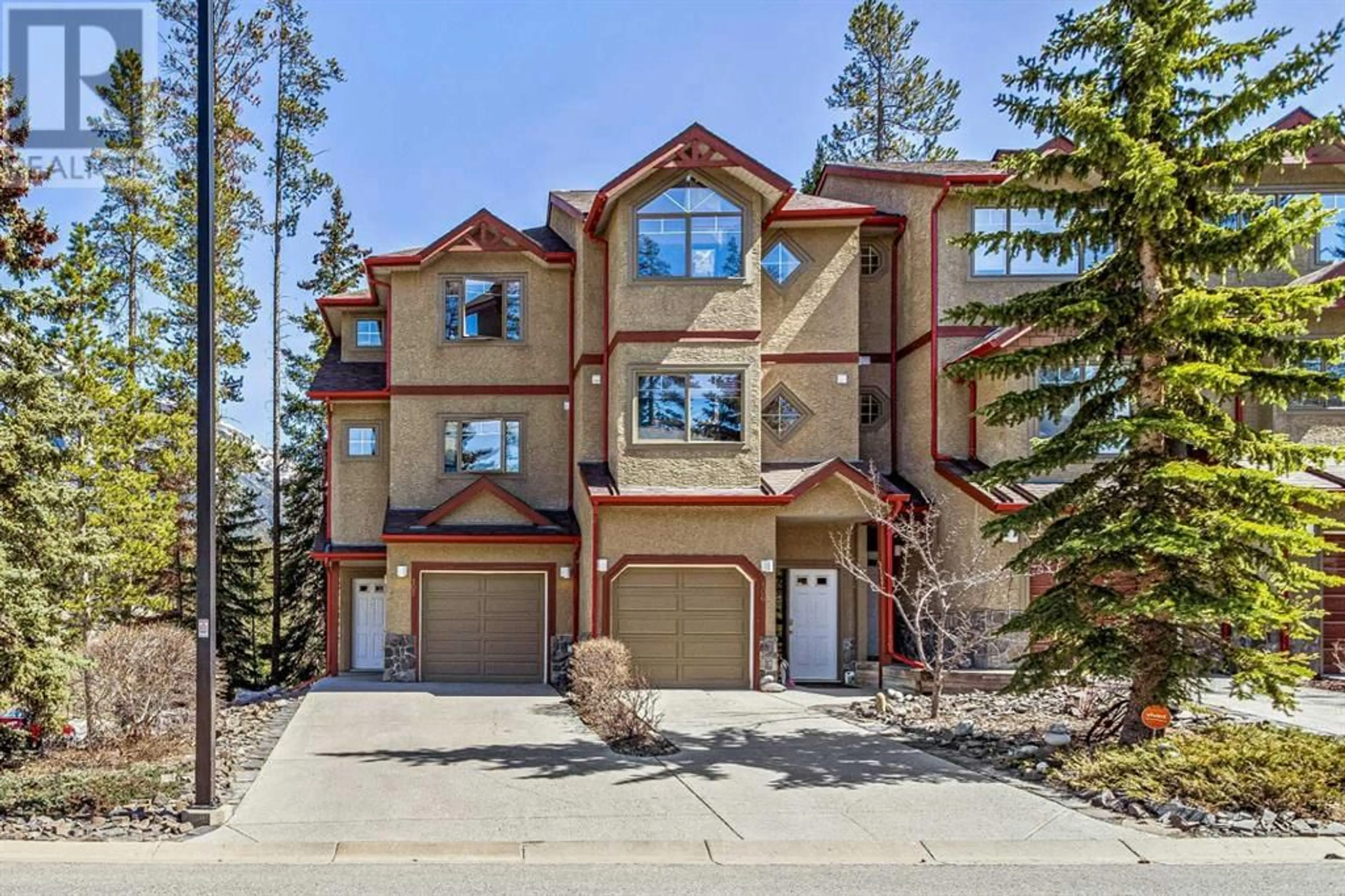 A pic from exterior of the house or condo for 102 901 Benchlands Trail, Canmore Alberta T1W2Z8