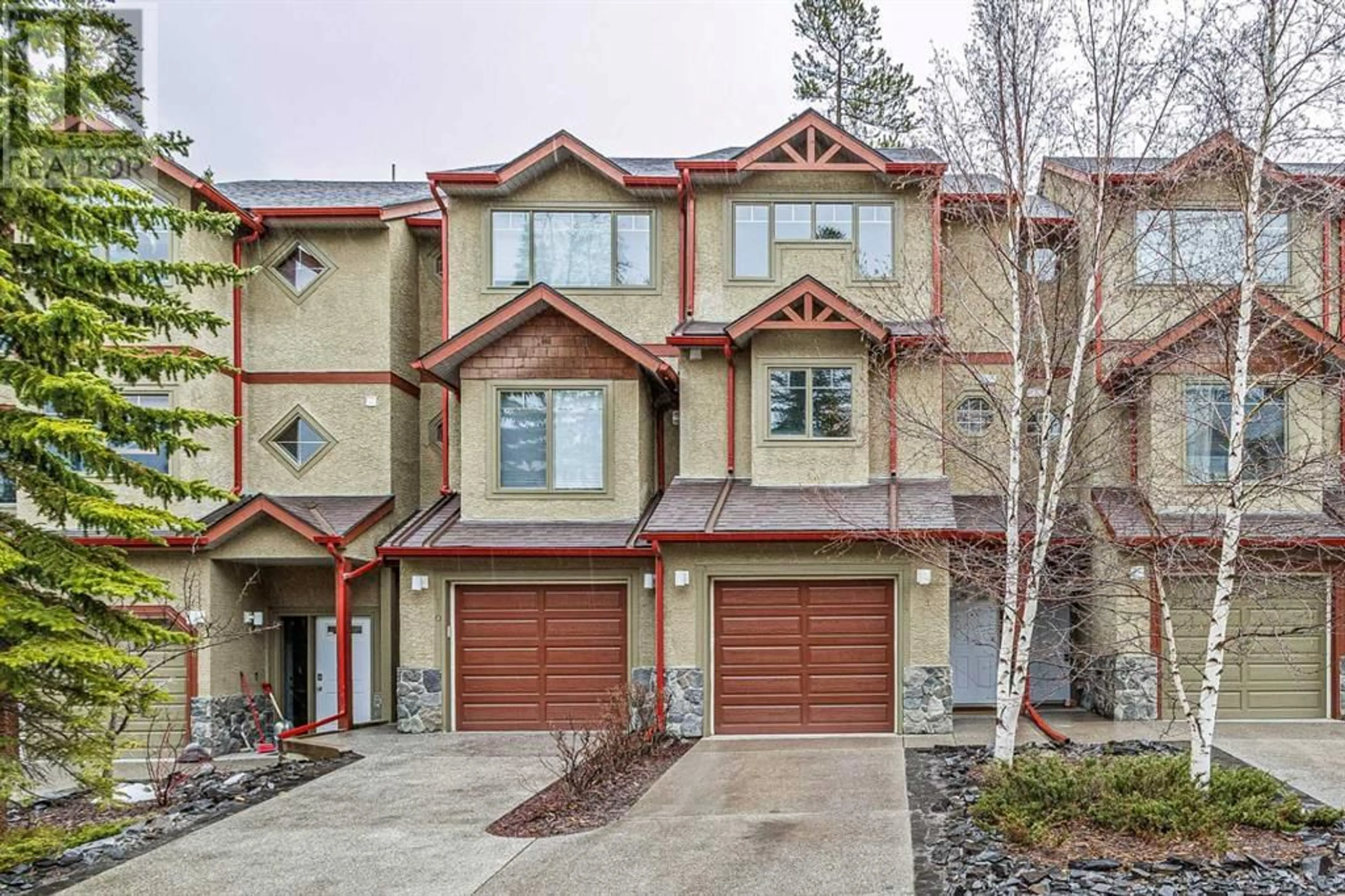 A pic from exterior of the house or condo for 114 901 Benchlands Trail, Canmore Alberta T1W2Z8
