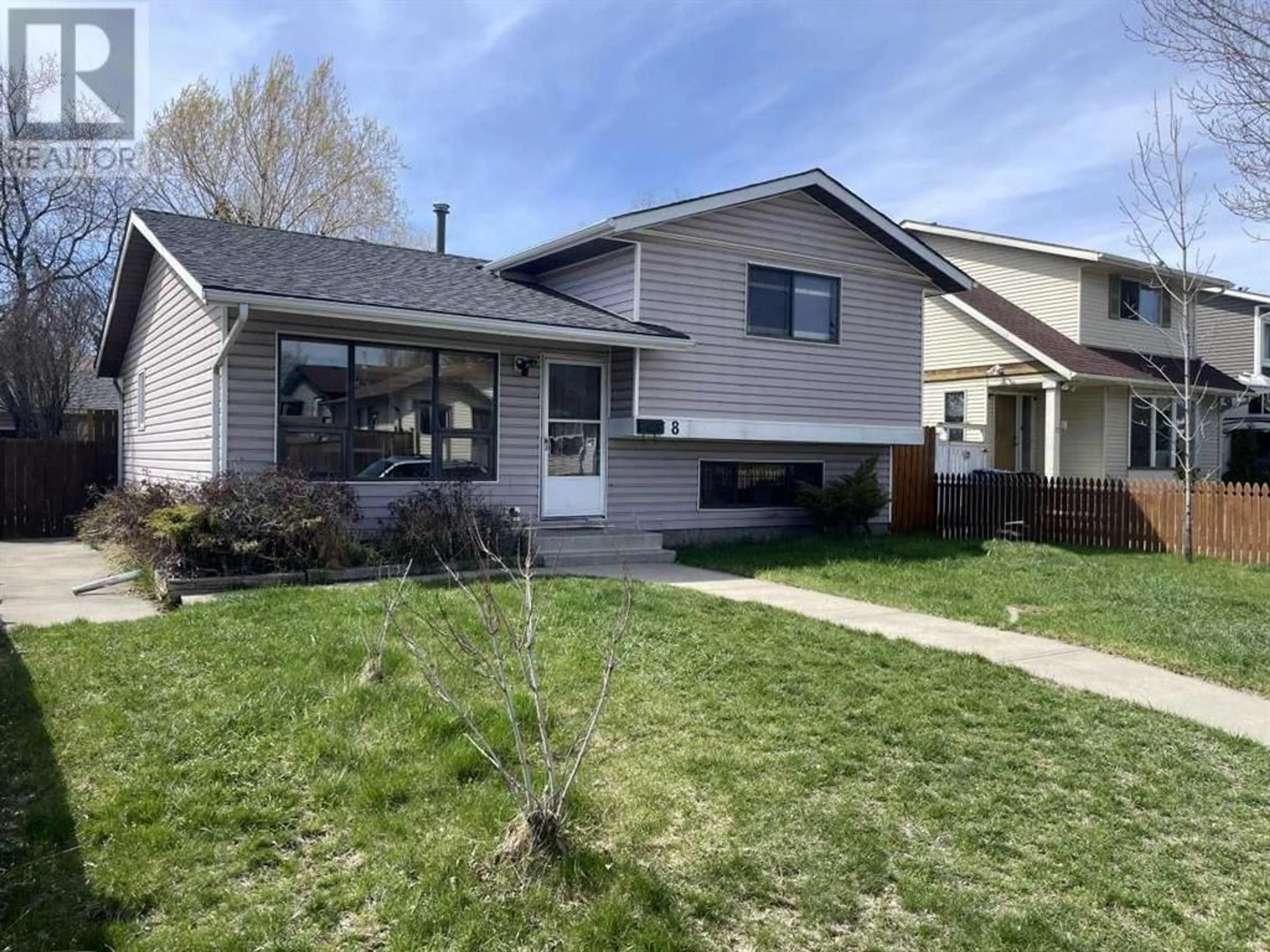 Frontside or backside of a home for 8 Abingdon Crescent NE, Calgary Alberta T2A6T1