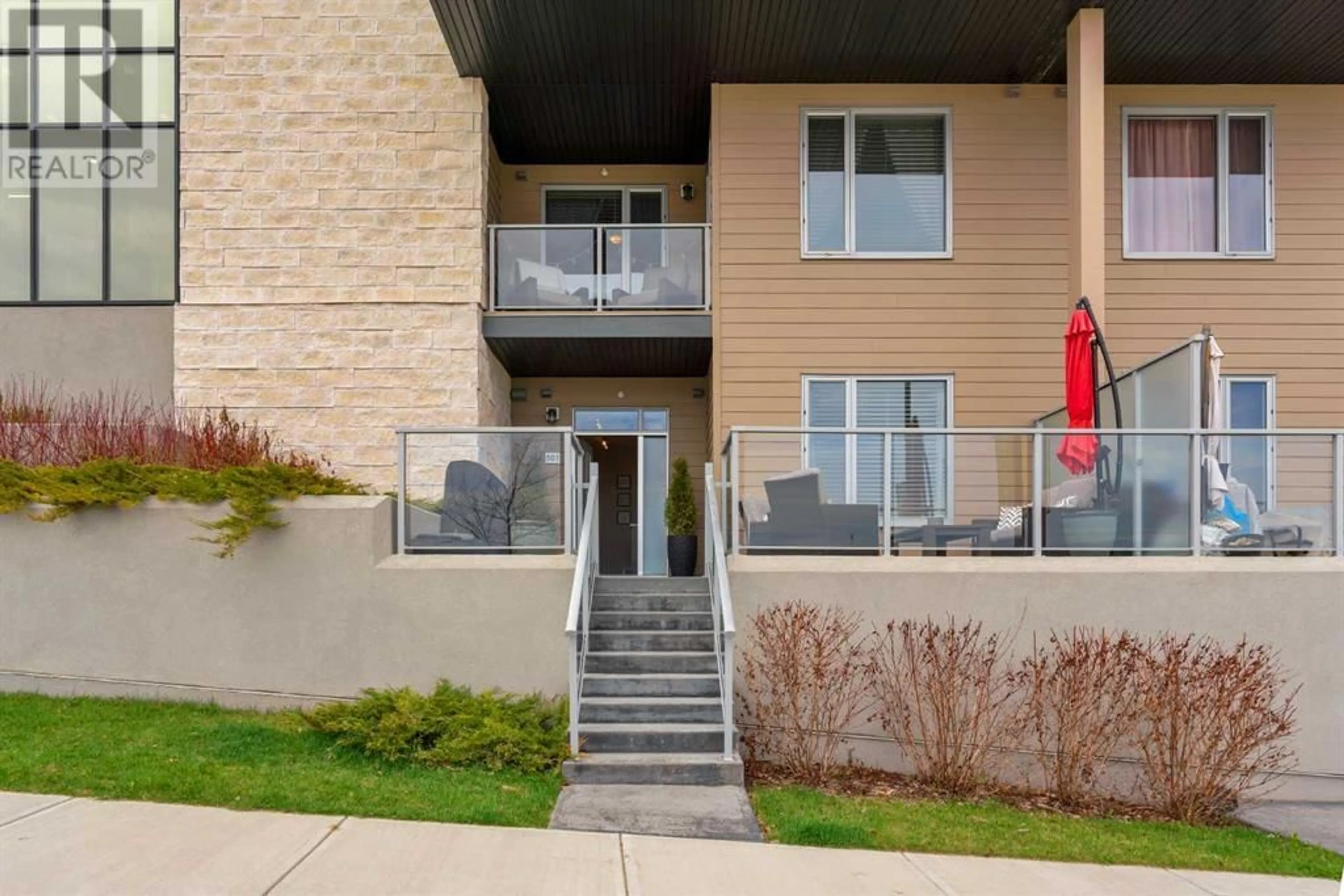 A pic from exterior of the house or condo for 101 30 Shawnee Common SW, Calgary Alberta T2Y0R1
