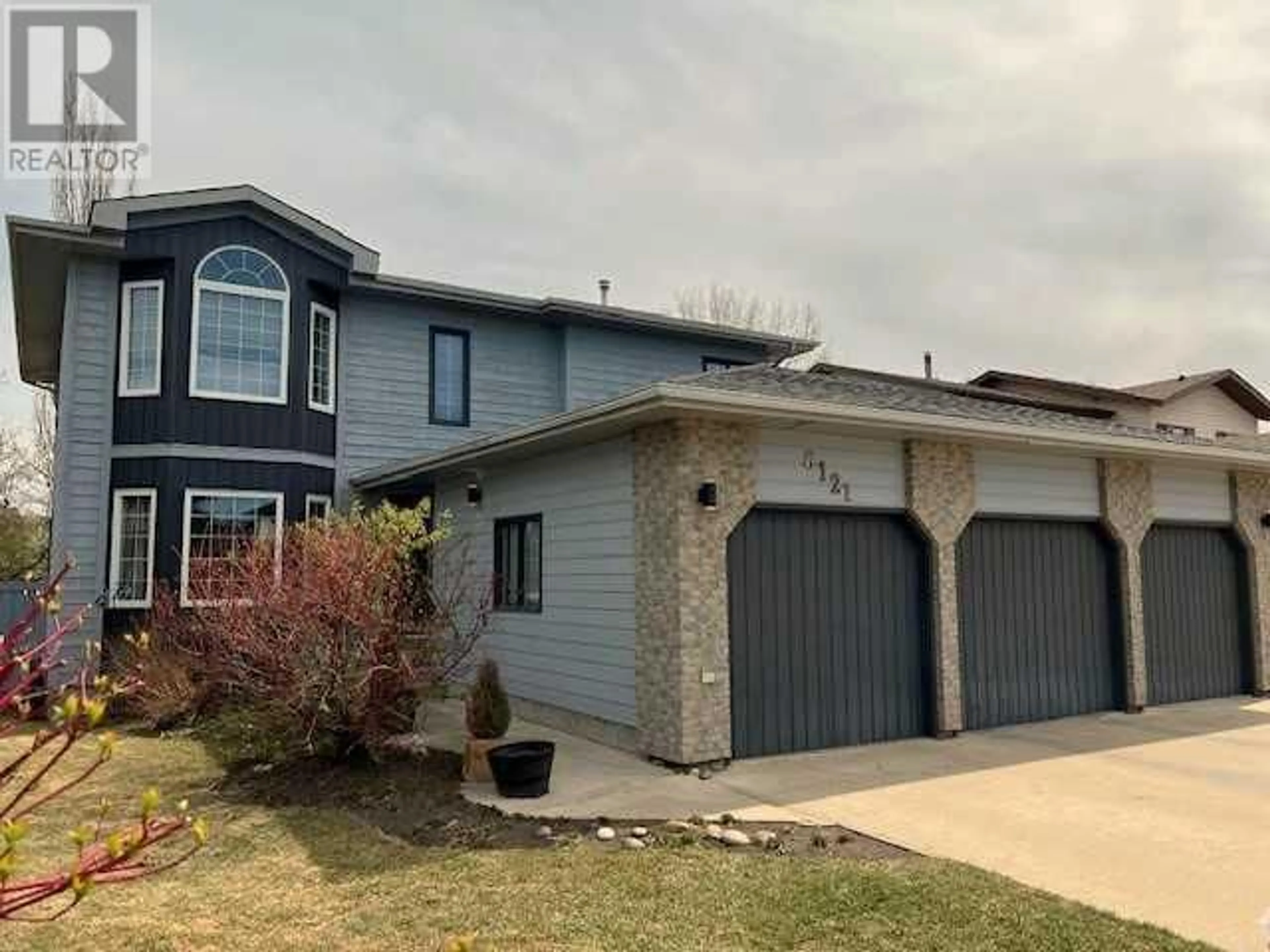 Frontside or backside of a home for 6121 96 Street, Grande Prairie Alberta T8W2C7