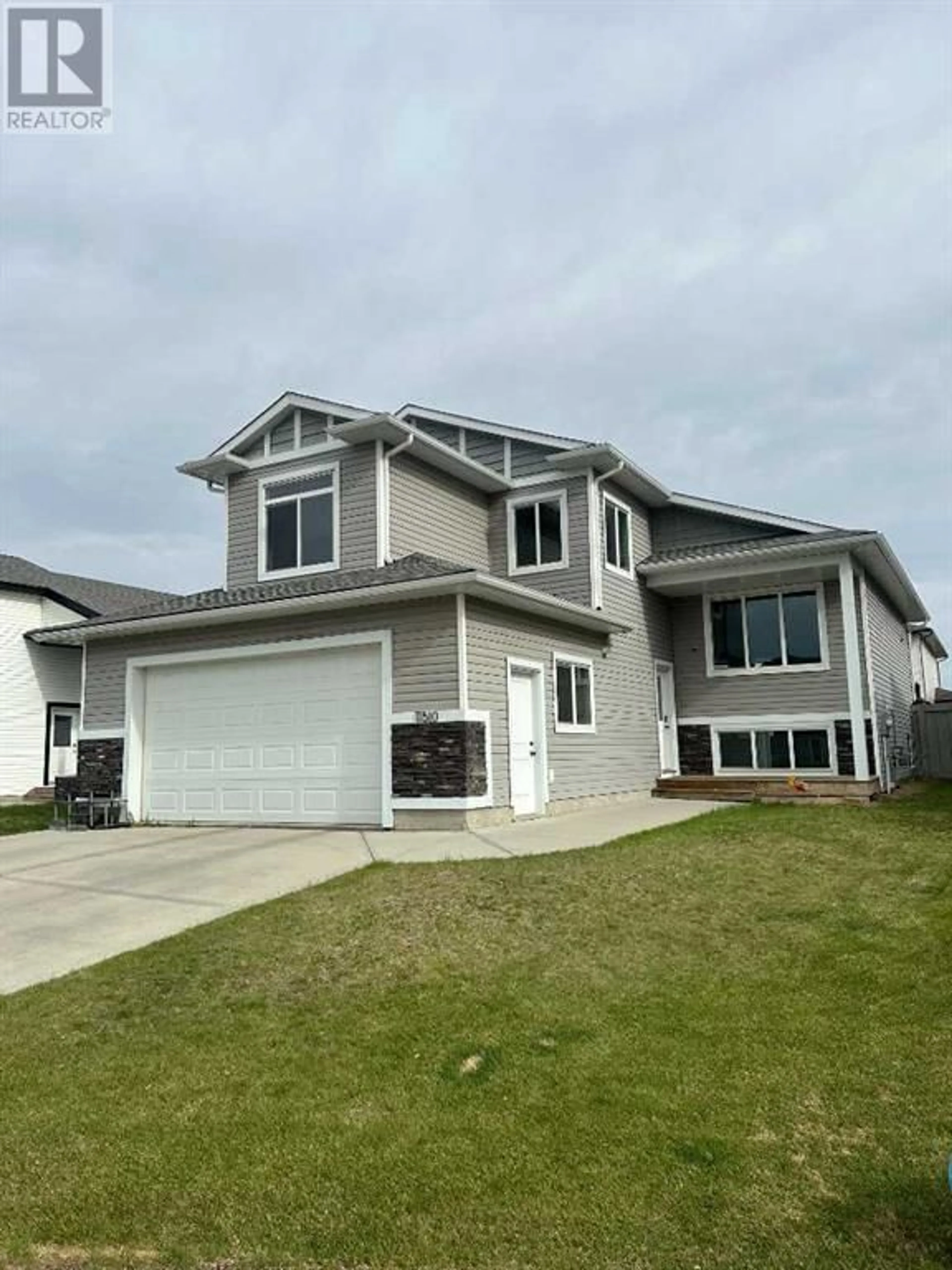 Frontside or backside of a home for 11510 72 Avenue, Grande Prairie Alberta T8W0H8