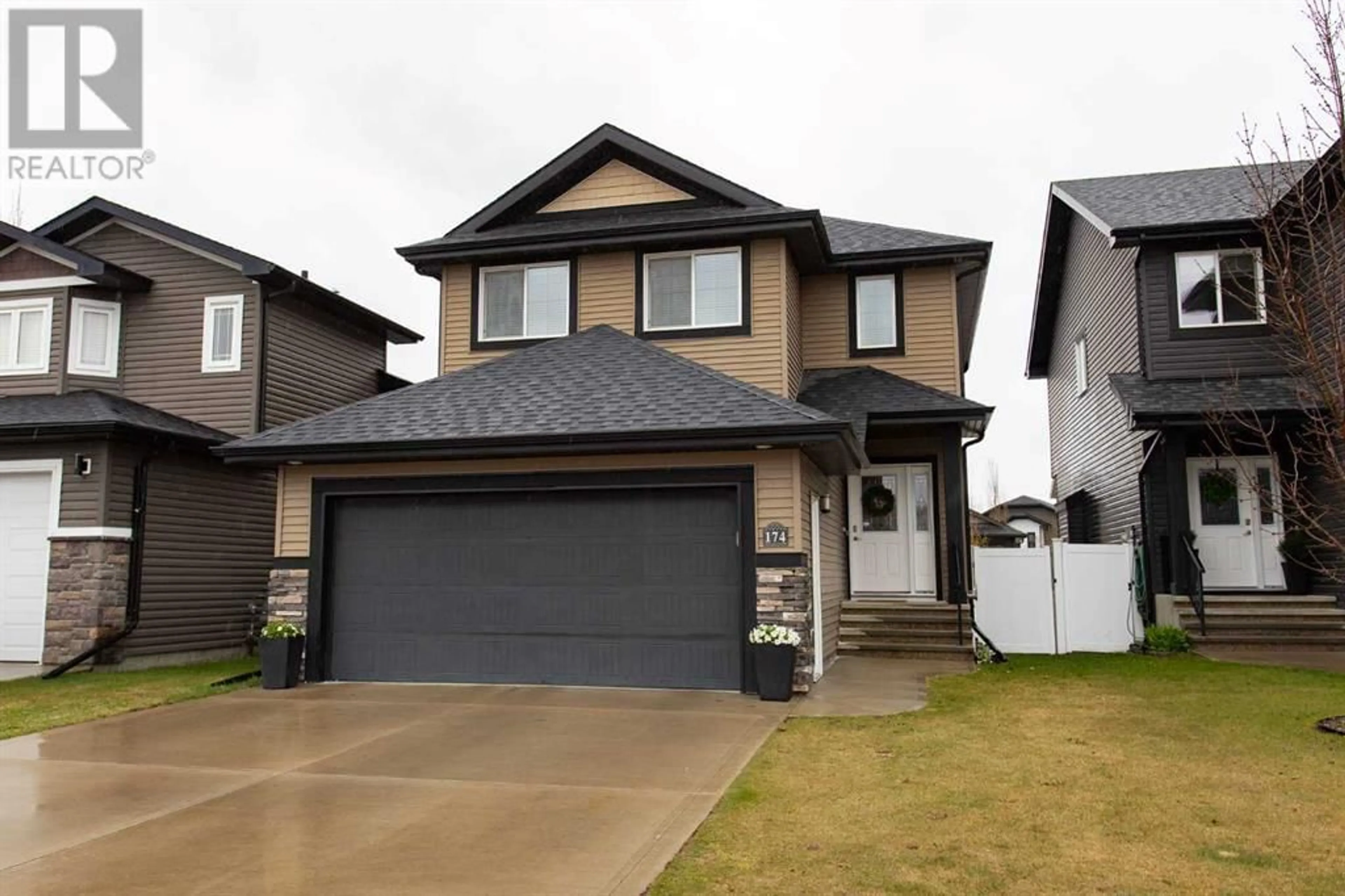 Frontside or backside of a home for 174 Viscount Drive, Red Deer Alberta T4R0M7