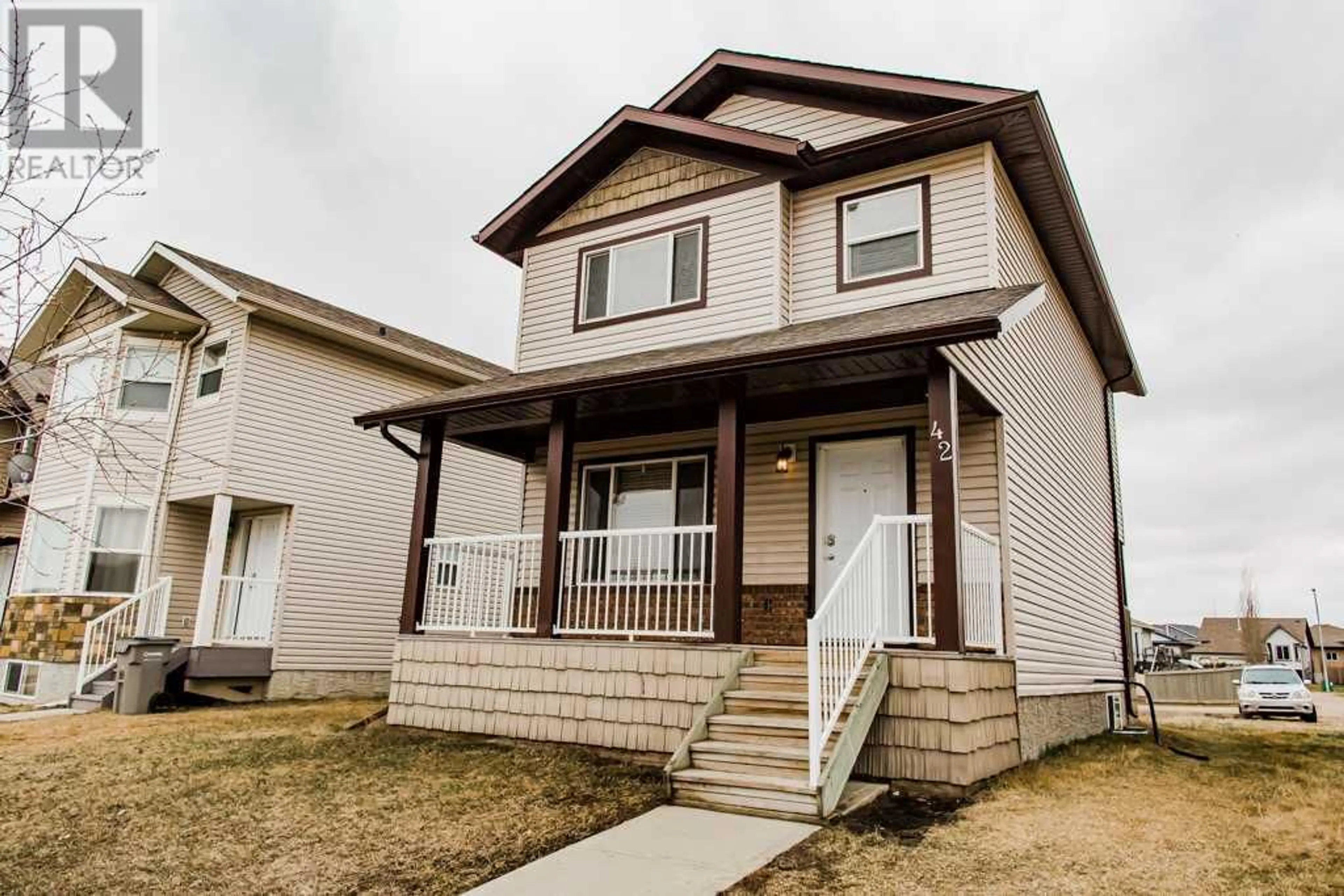 Frontside or backside of a home for 42 Pinnacle Street, Grande Prairie Alberta T8W0A9