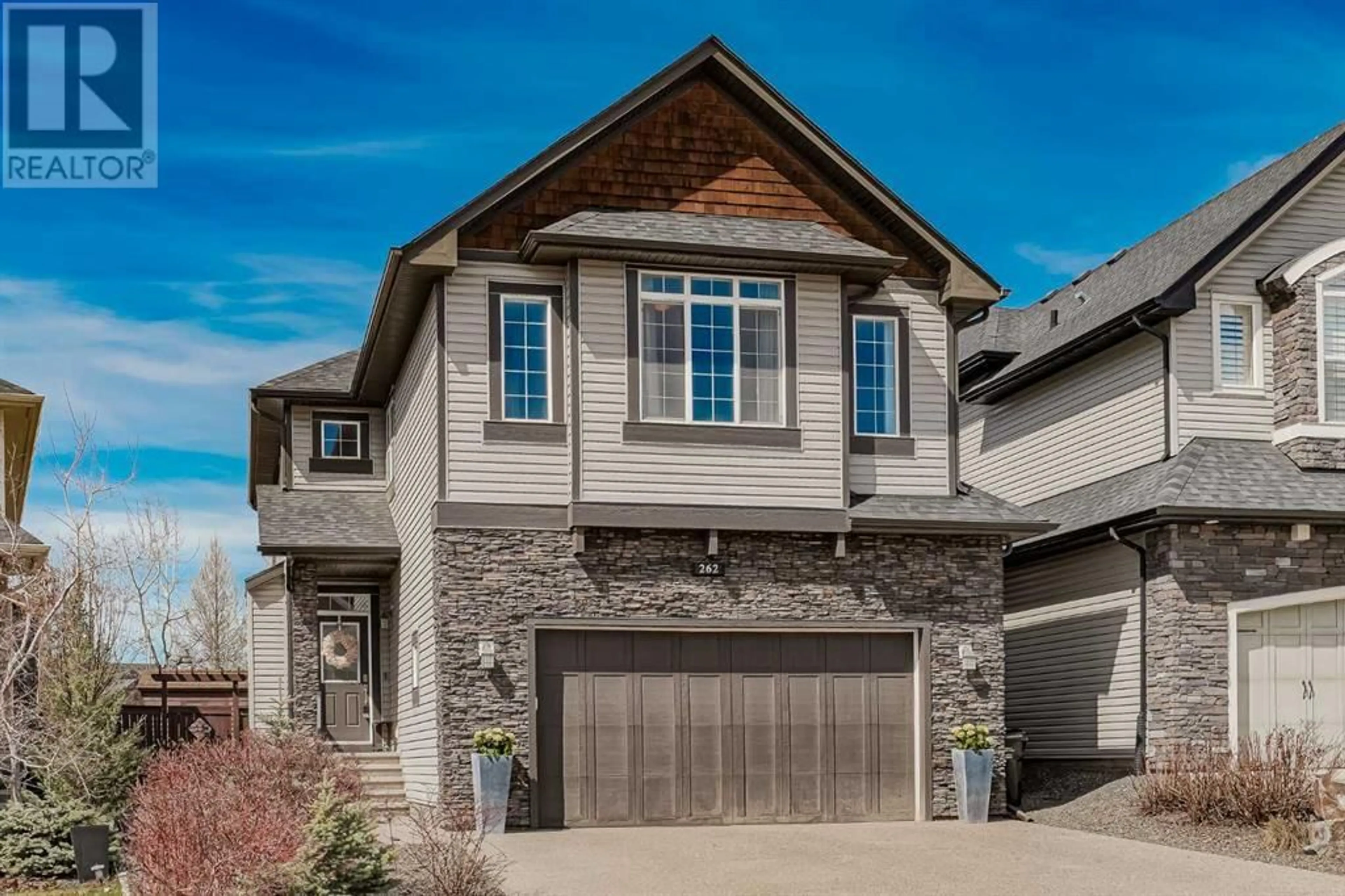 Frontside or backside of a home for 262 Tremblant Way SW, Calgary Alberta T3H0B7