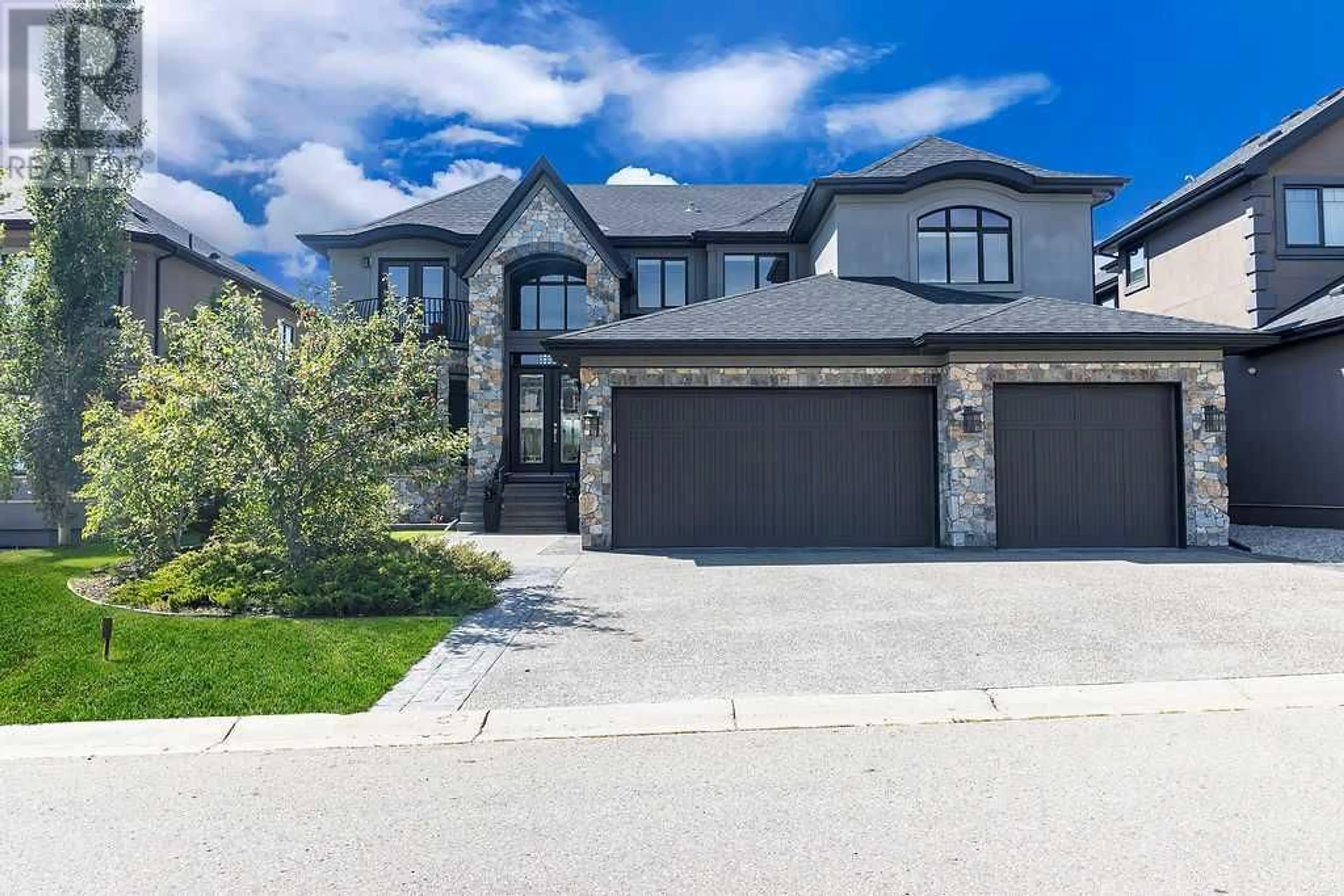 Frontside or backside of a home for 32 Aspen Ridge Manor SW, Calgary Alberta T3H0T4