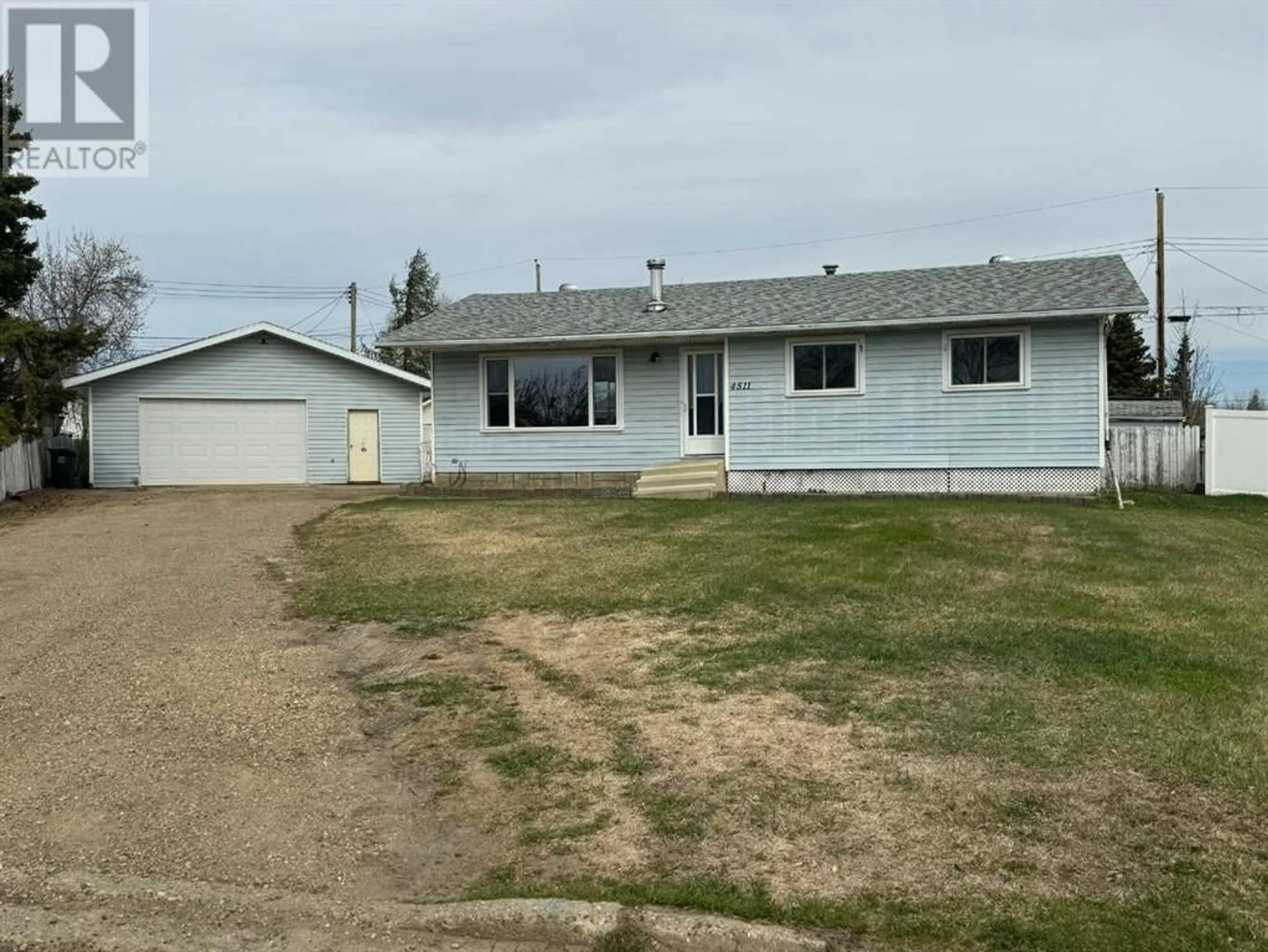 Frontside or backside of a home for 4511 47A Street, Grimshaw Alberta T0H1W0