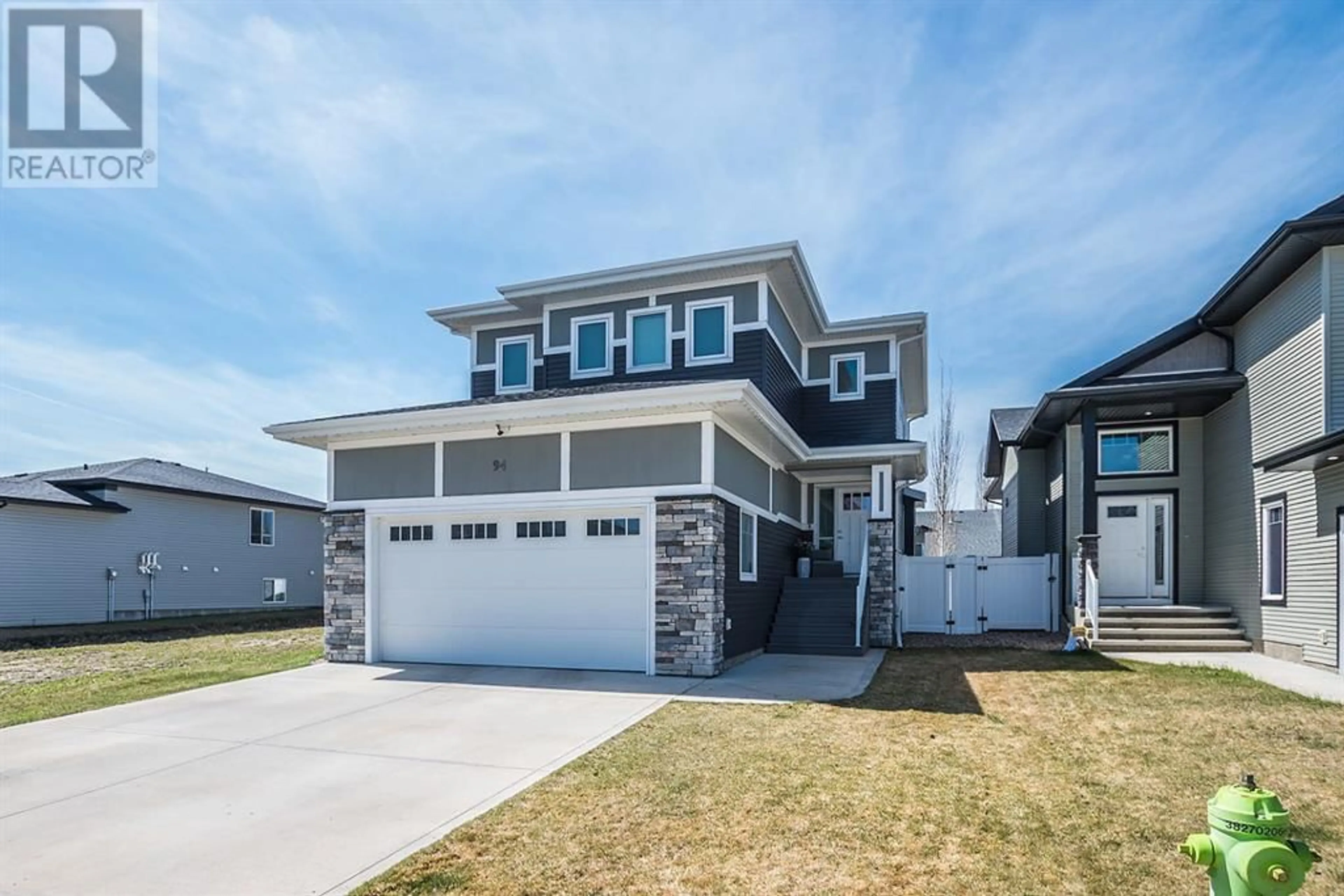Frontside or backside of a home for 94 Lalor Drive, Red Deer Alberta T4R0R6