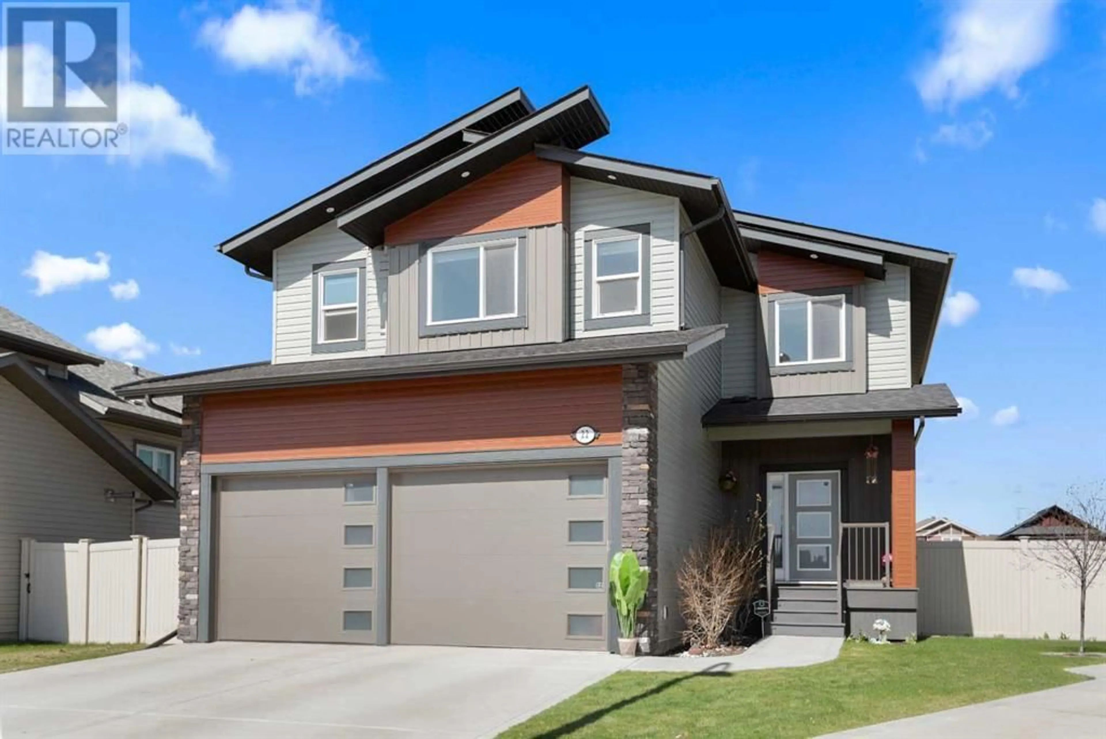 Home with brick exterior material for 22 Victory Close, Red Deer Alberta T4R0N4