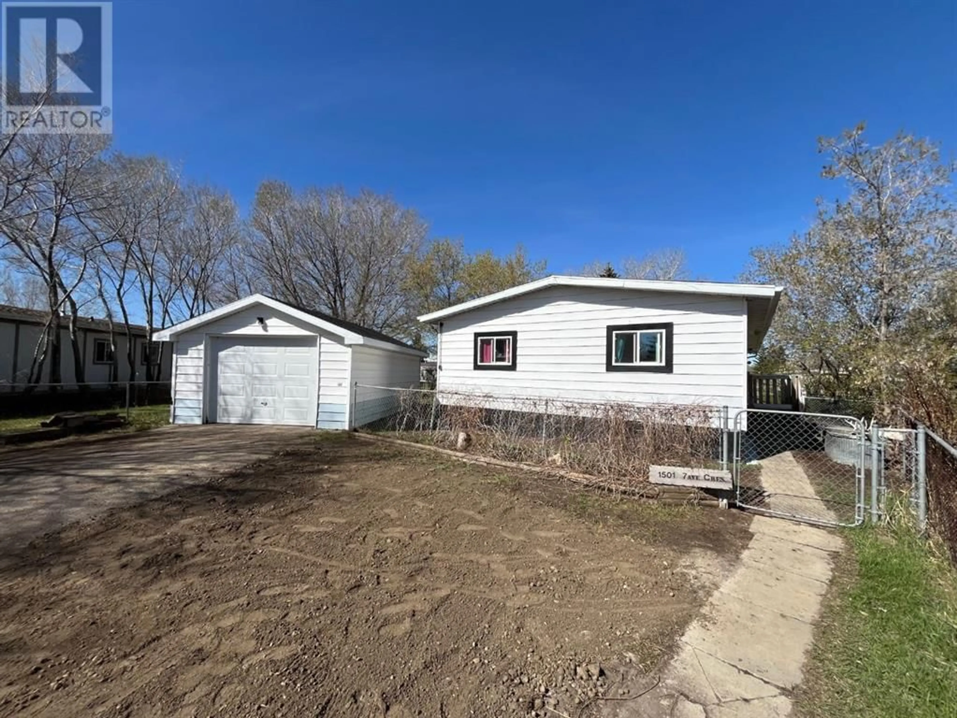 Frontside or backside of a home for 1501 7 AvenueCrescent, Wainwright Alberta T9W1H7