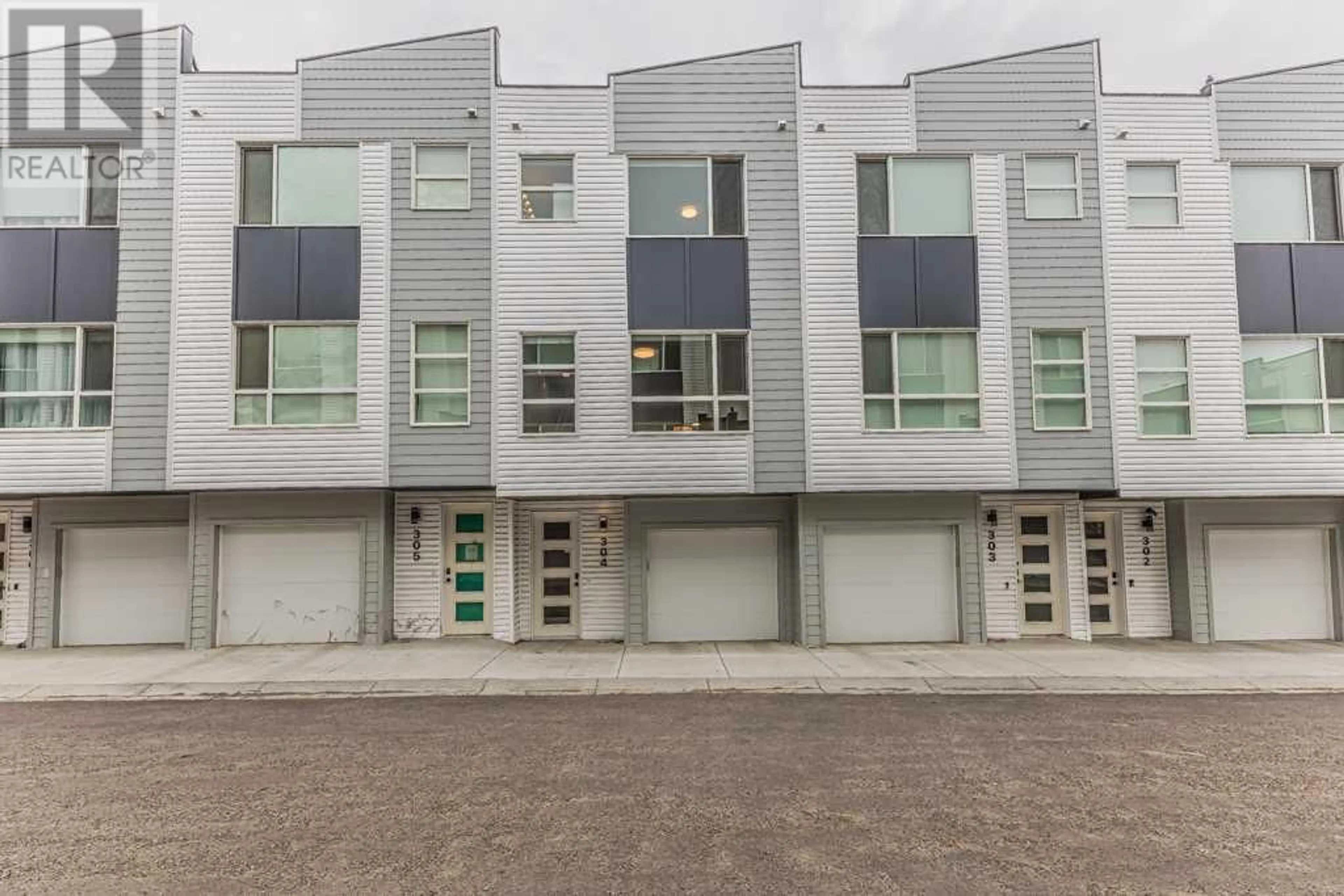 A pic from exterior of the house or condo for 304 101 Panatella Square NW, Calgary Alberta T3K2R9