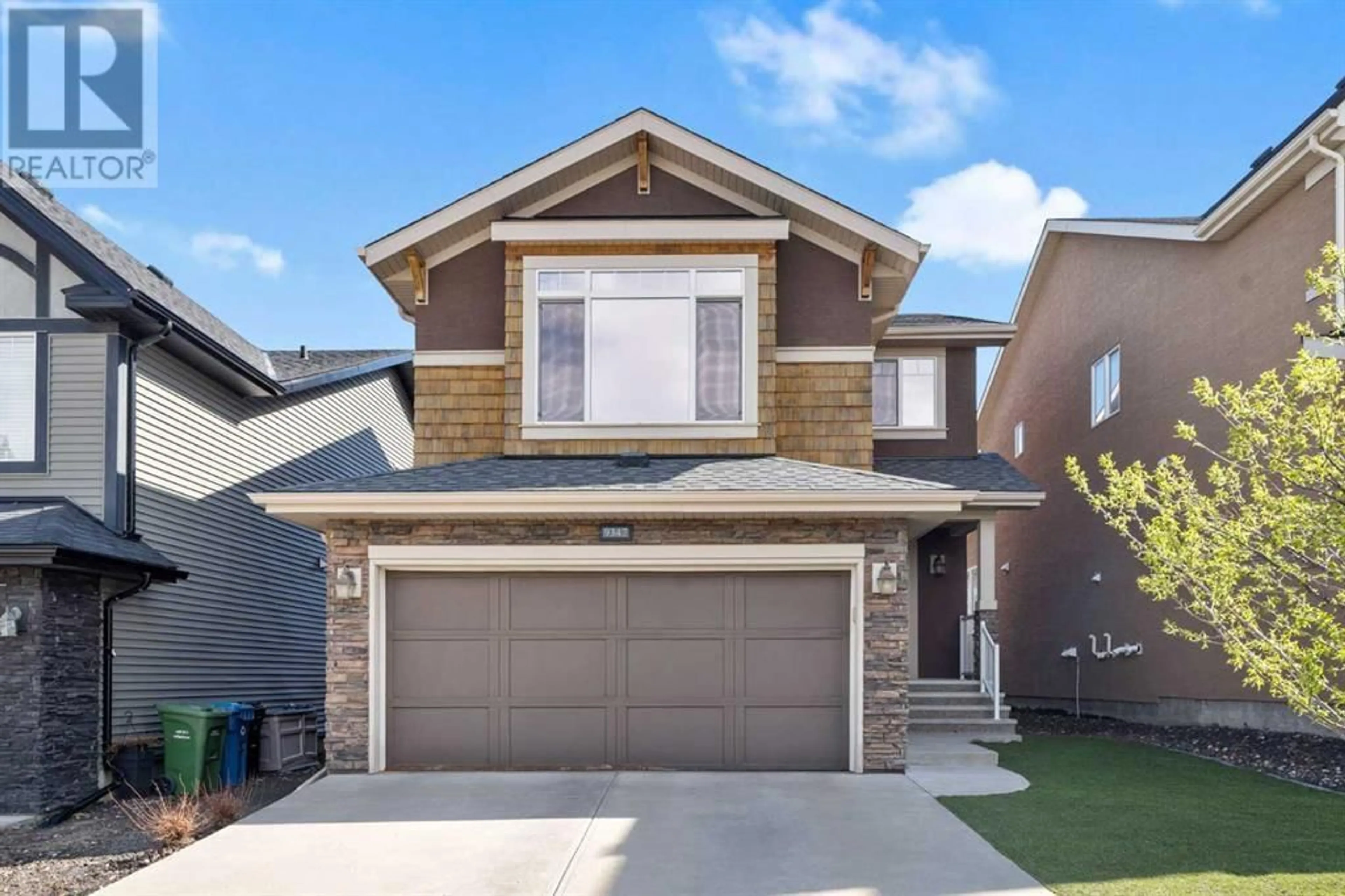 Frontside or backside of a home for 9347 14 Avenue SW, Calgary Alberta T3H4A9