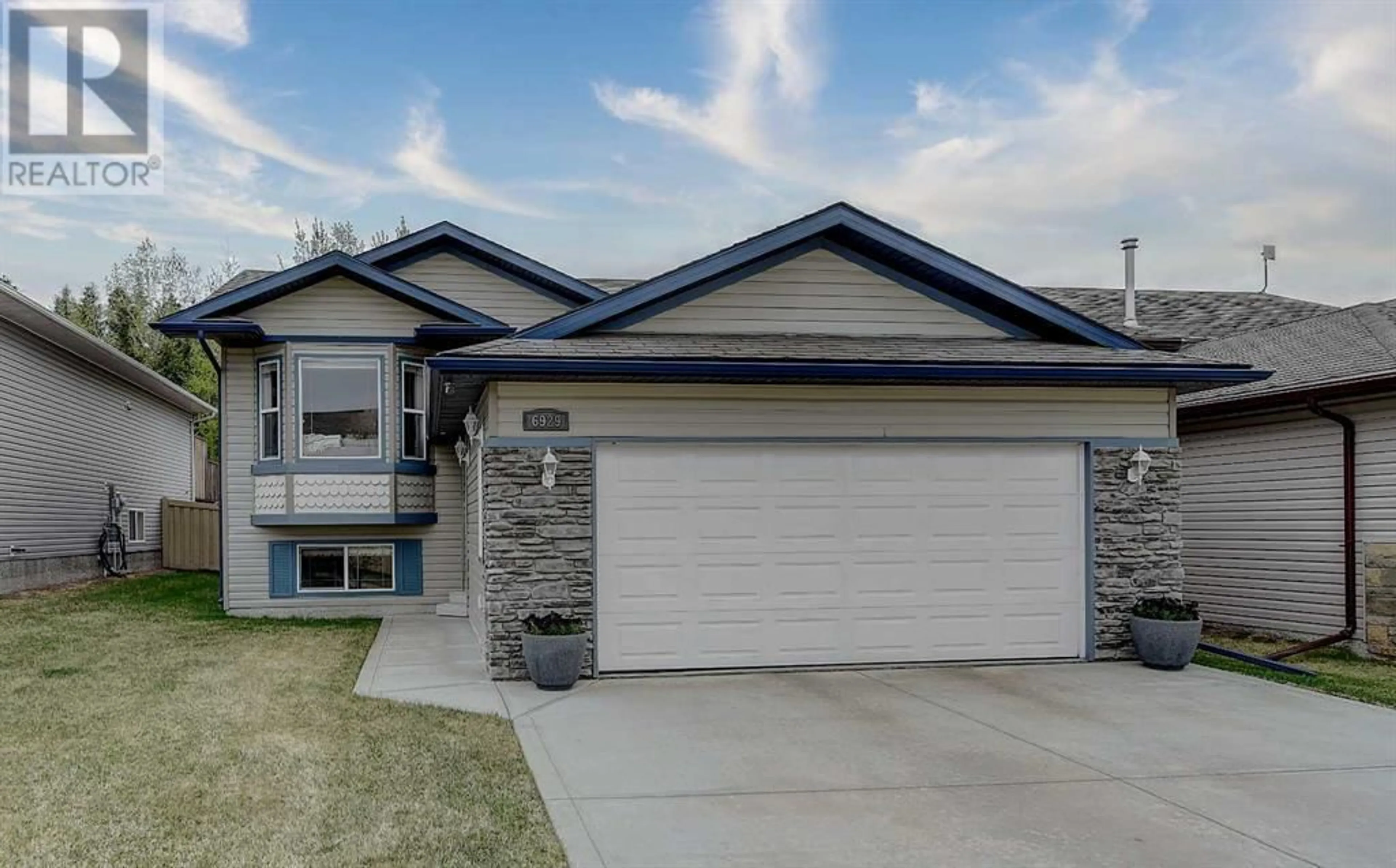 Frontside or backside of a home for 6929 88 Street, Grande Prairie Alberta T8X0C1
