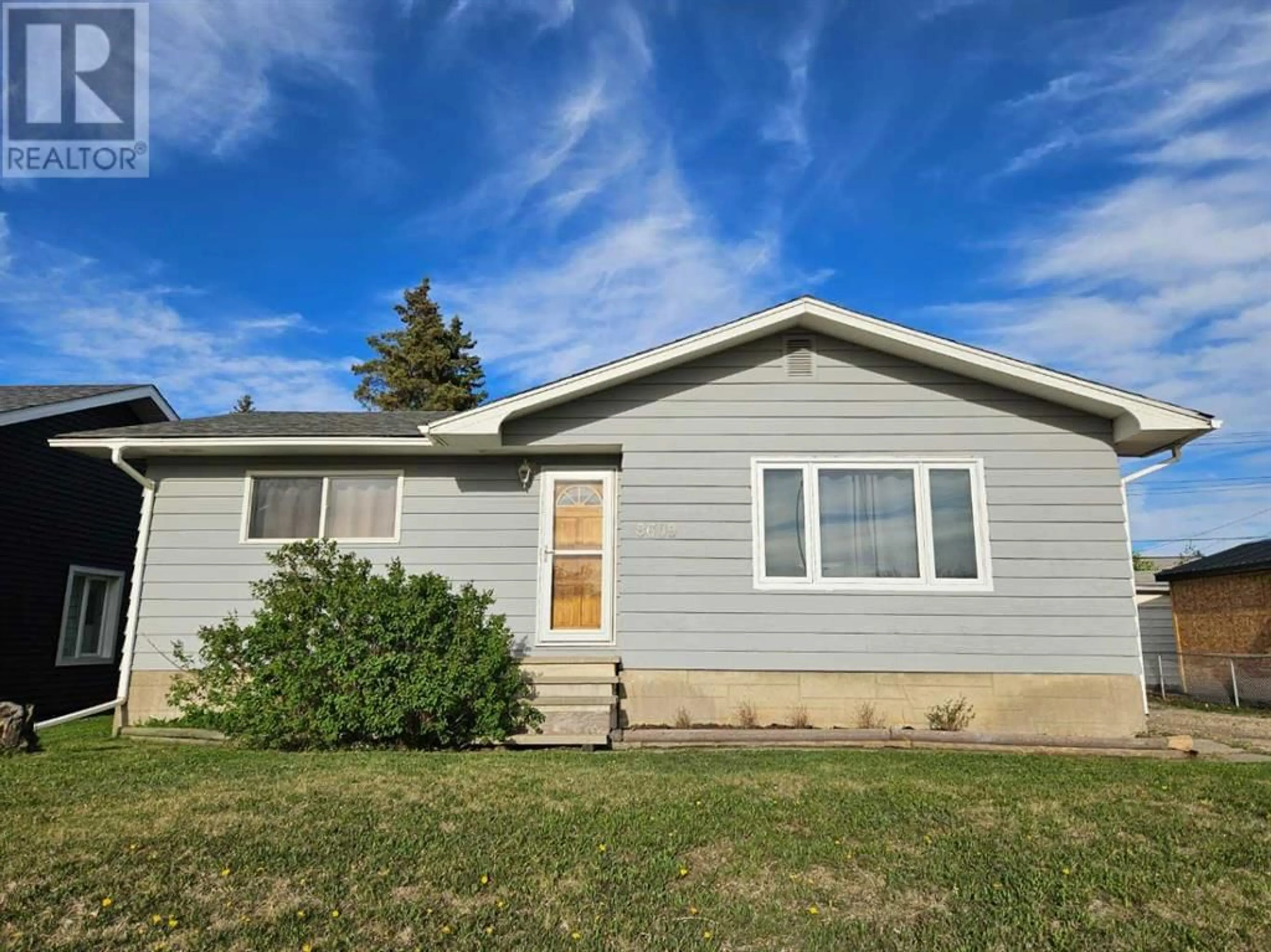Frontside or backside of a home for 8609 100 Street, Grande Prairie Alberta T8V2J9