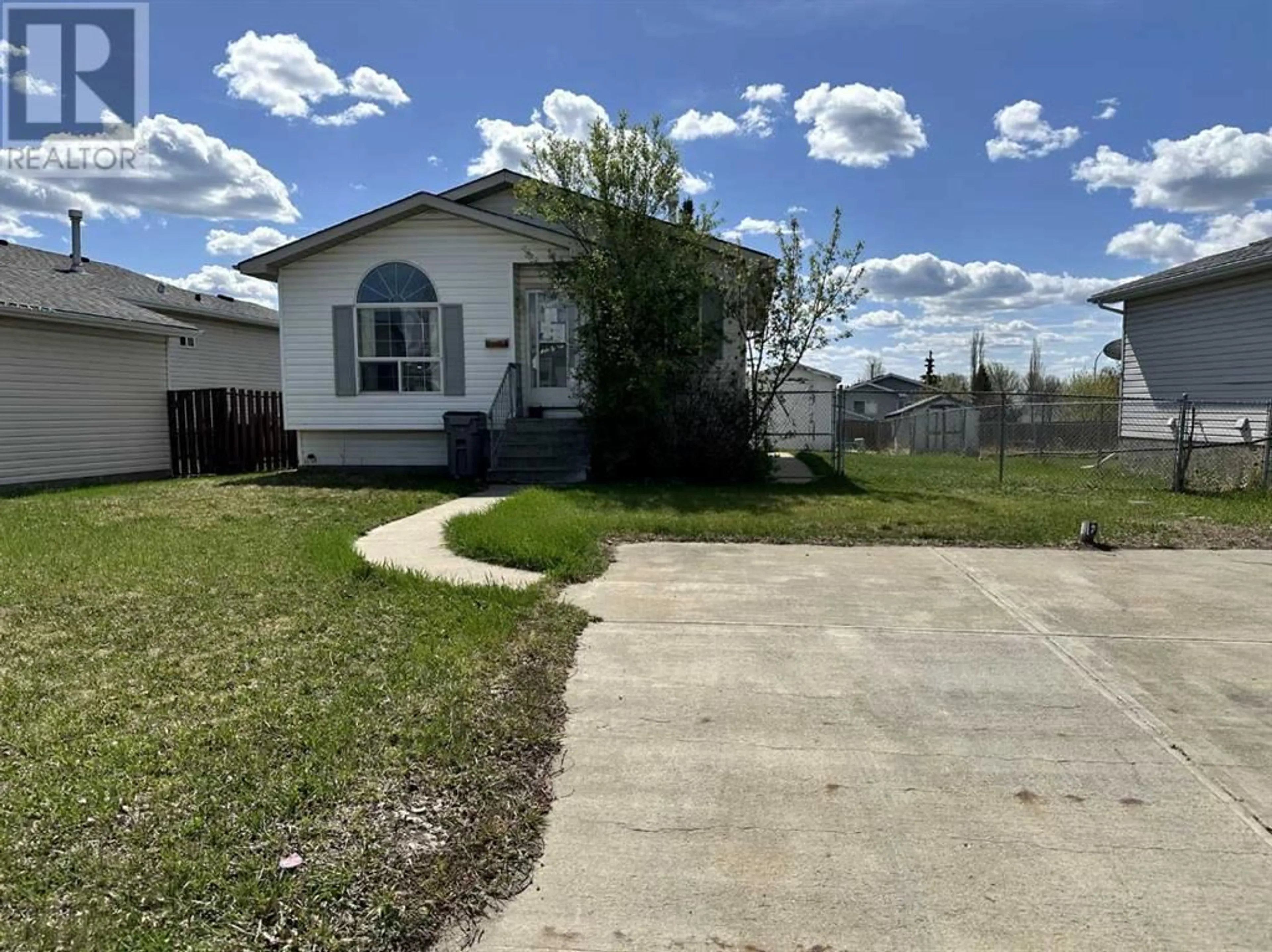 Frontside or backside of a home for 8829 104 Avenue, Grande Prairie Alberta T8X1K9