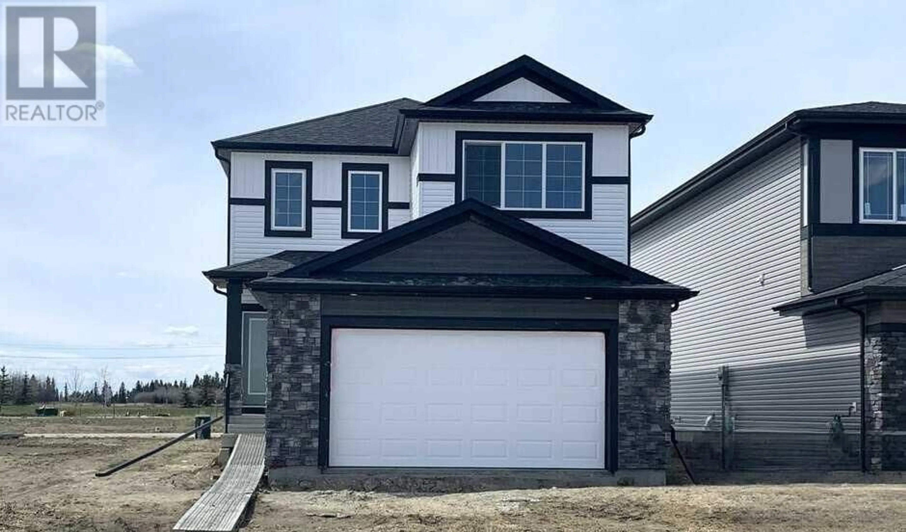 Frontside or backside of a home for 108 Emerald Drive, Red Deer Alberta T4E1A6