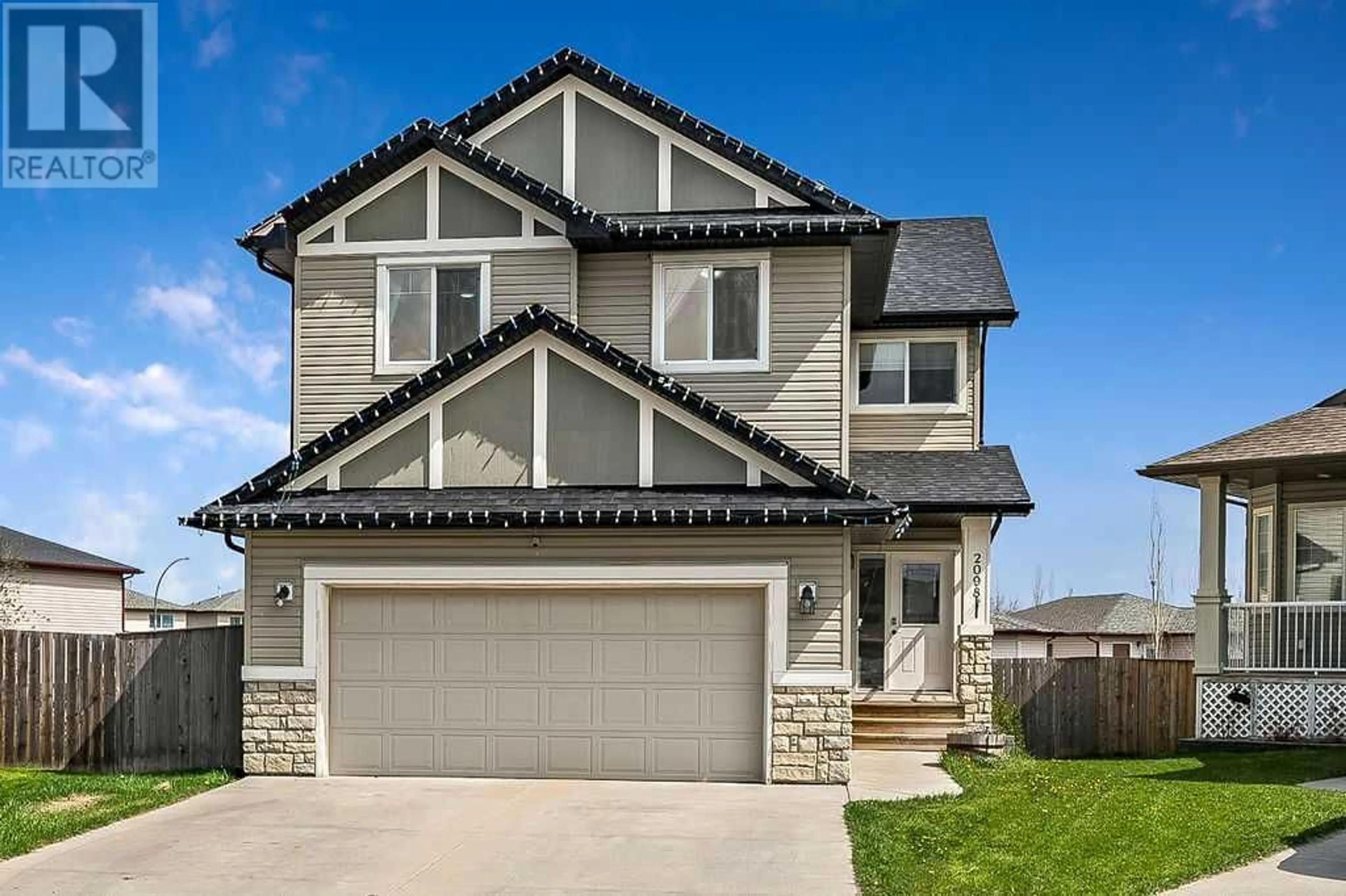 Frontside or backside of a home for 2098 High Country Rise NW, High River Alberta T1V0E2