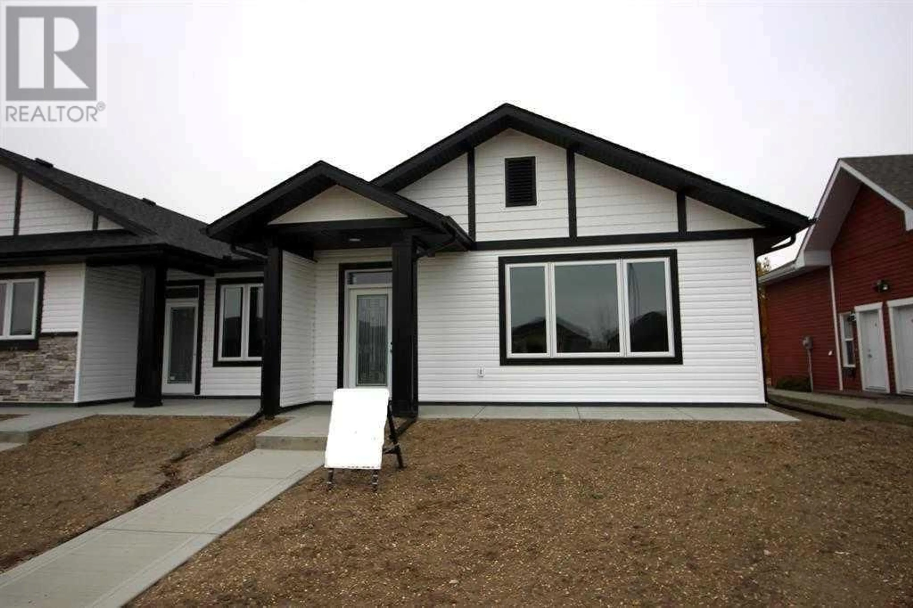 Home with vinyl exterior material for 6209 Valleyview Drive, Camrose Alberta T4V5J8