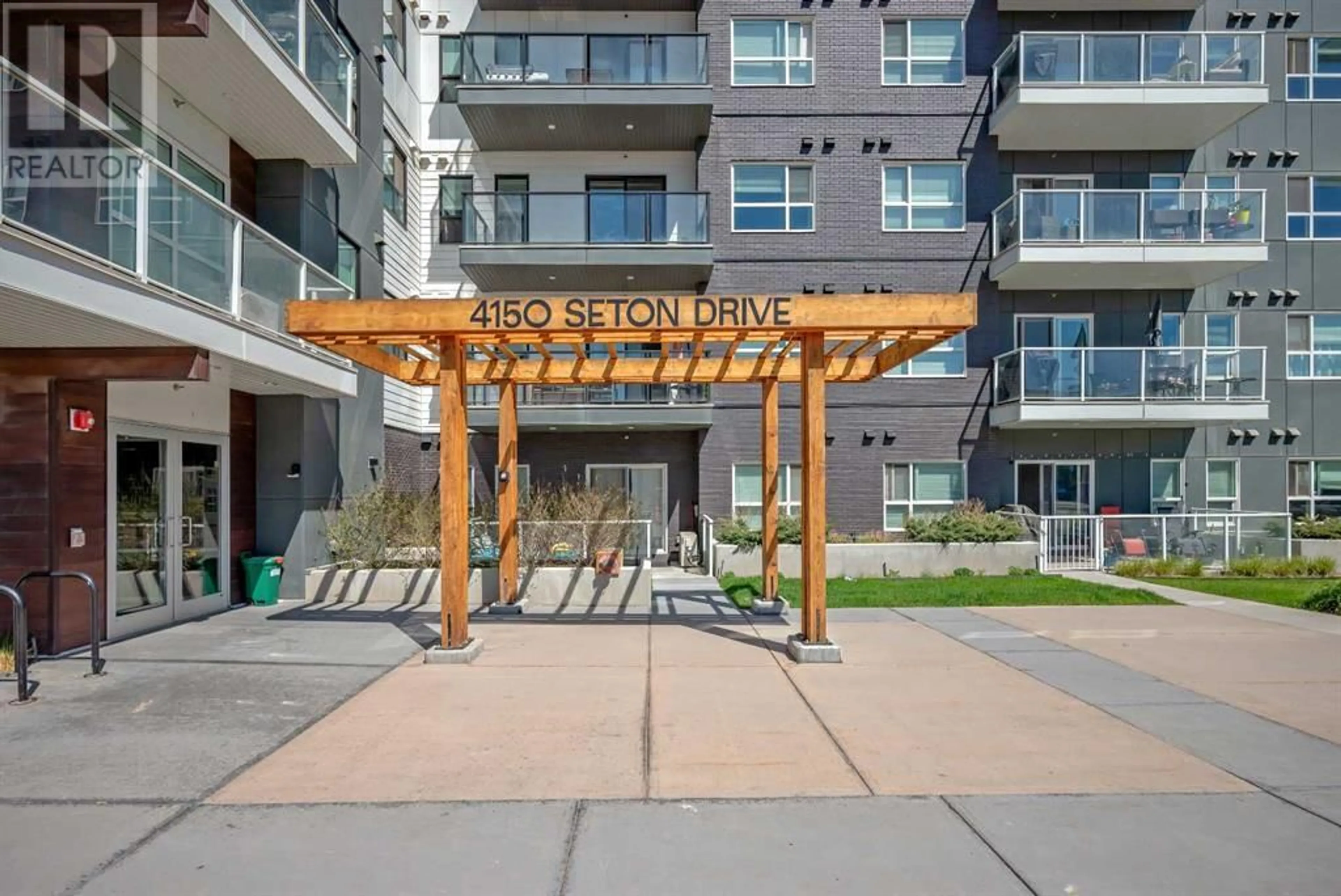 A pic from exterior of the house or condo for 303 4150 Seton Drive SE, Calgary Alberta T3M3C7