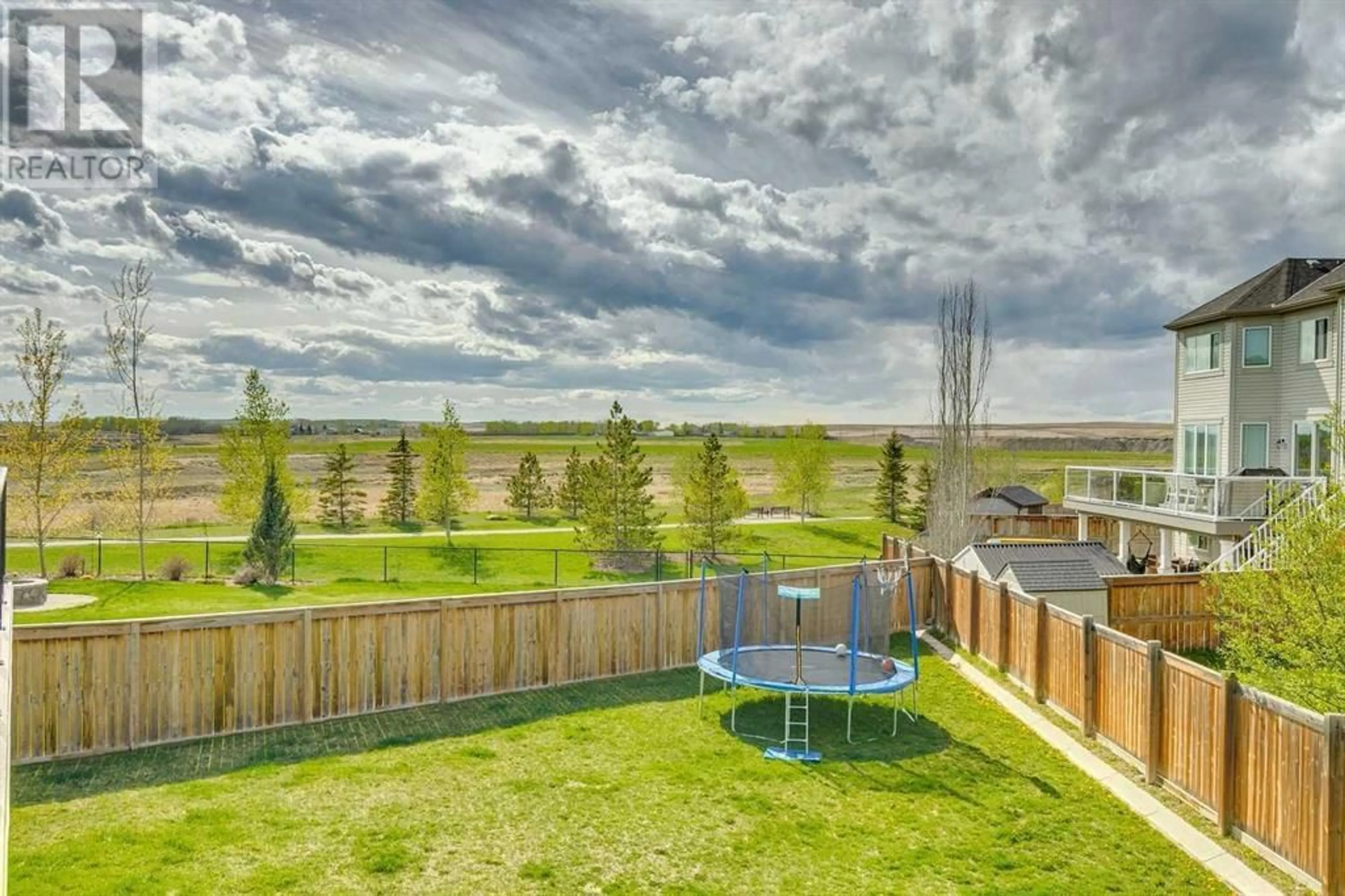 Fenced yard for 56 Windgate Close SW, Airdrie Alberta T4B3S9