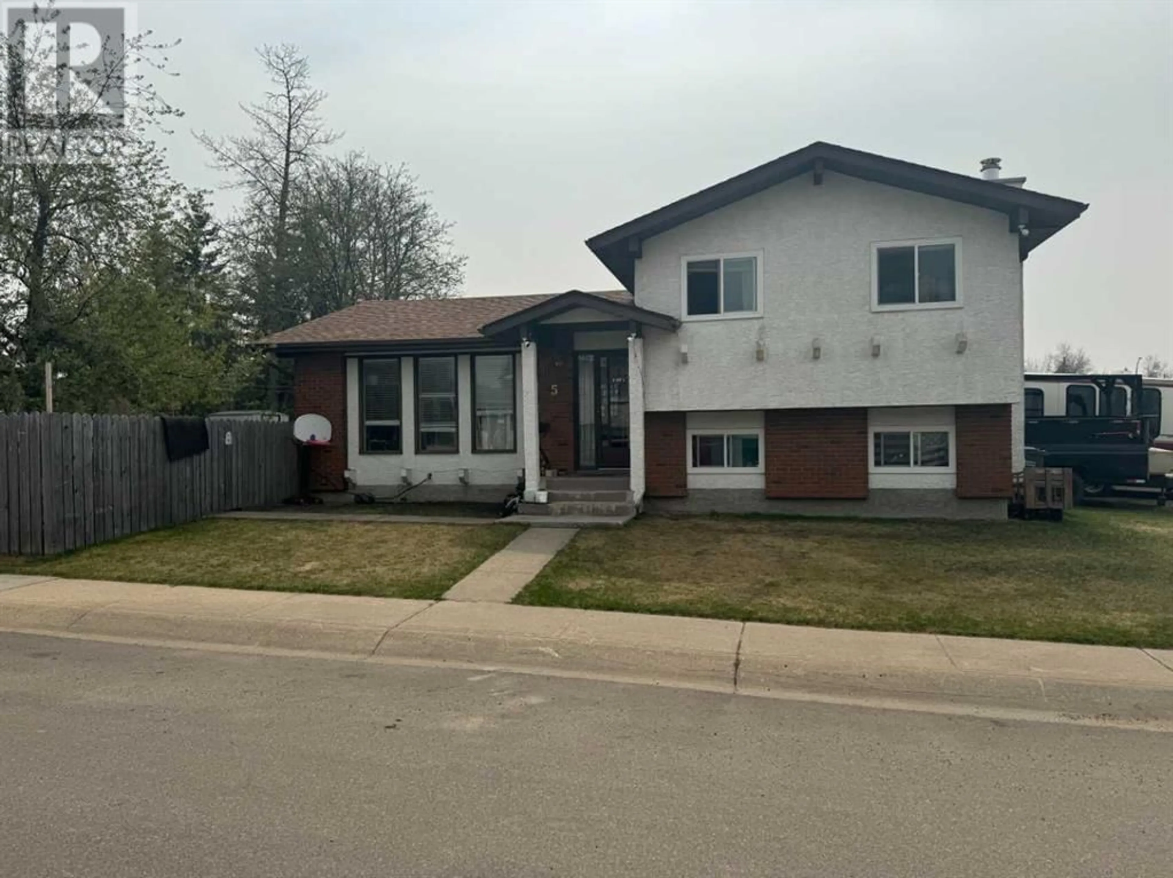 Frontside or backside of a home for 5 Cunningham Crescent, Red Deer Alberta T4P2S2