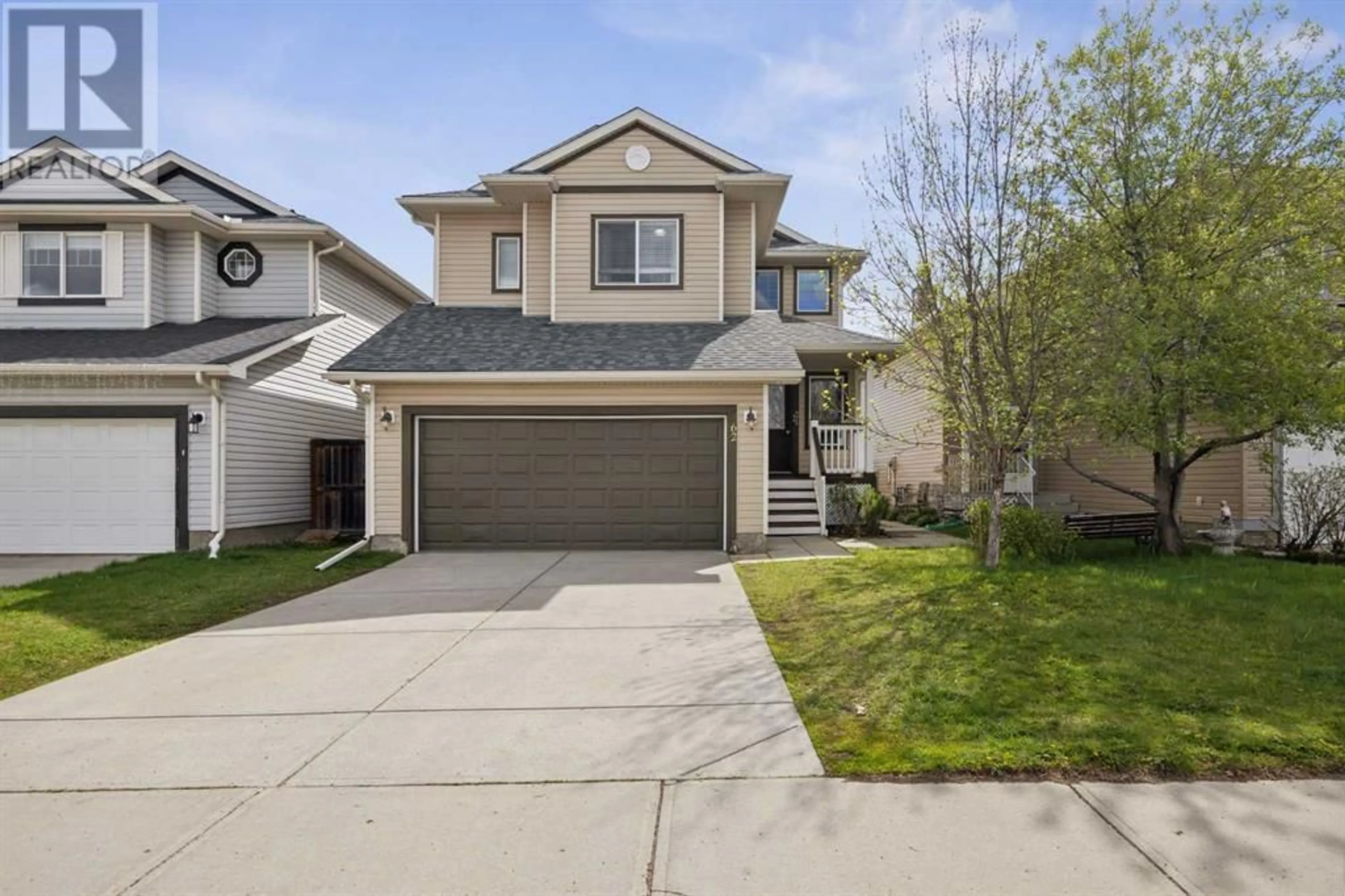 Frontside or backside of a home for 62 Bridleridge Way SW, Calgary Alberta T2Y4G9