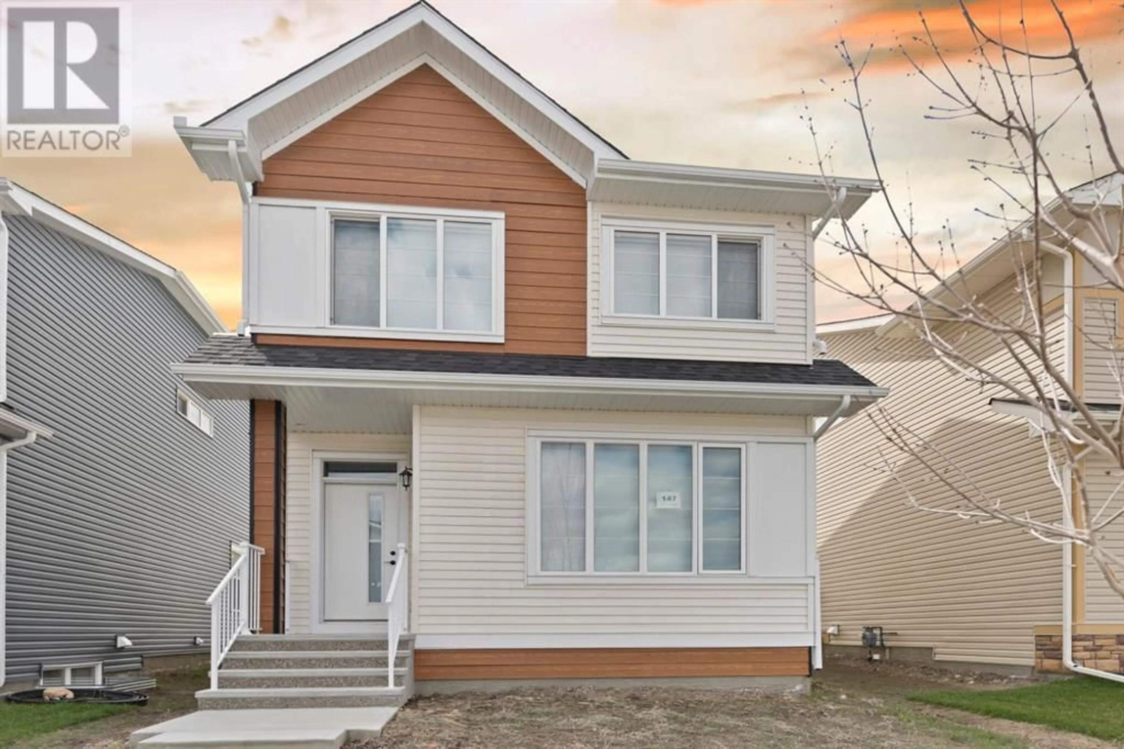 Frontside or backside of a home for 147 Dawson Harbour Hill, Chestermere Alberta T1X0L3