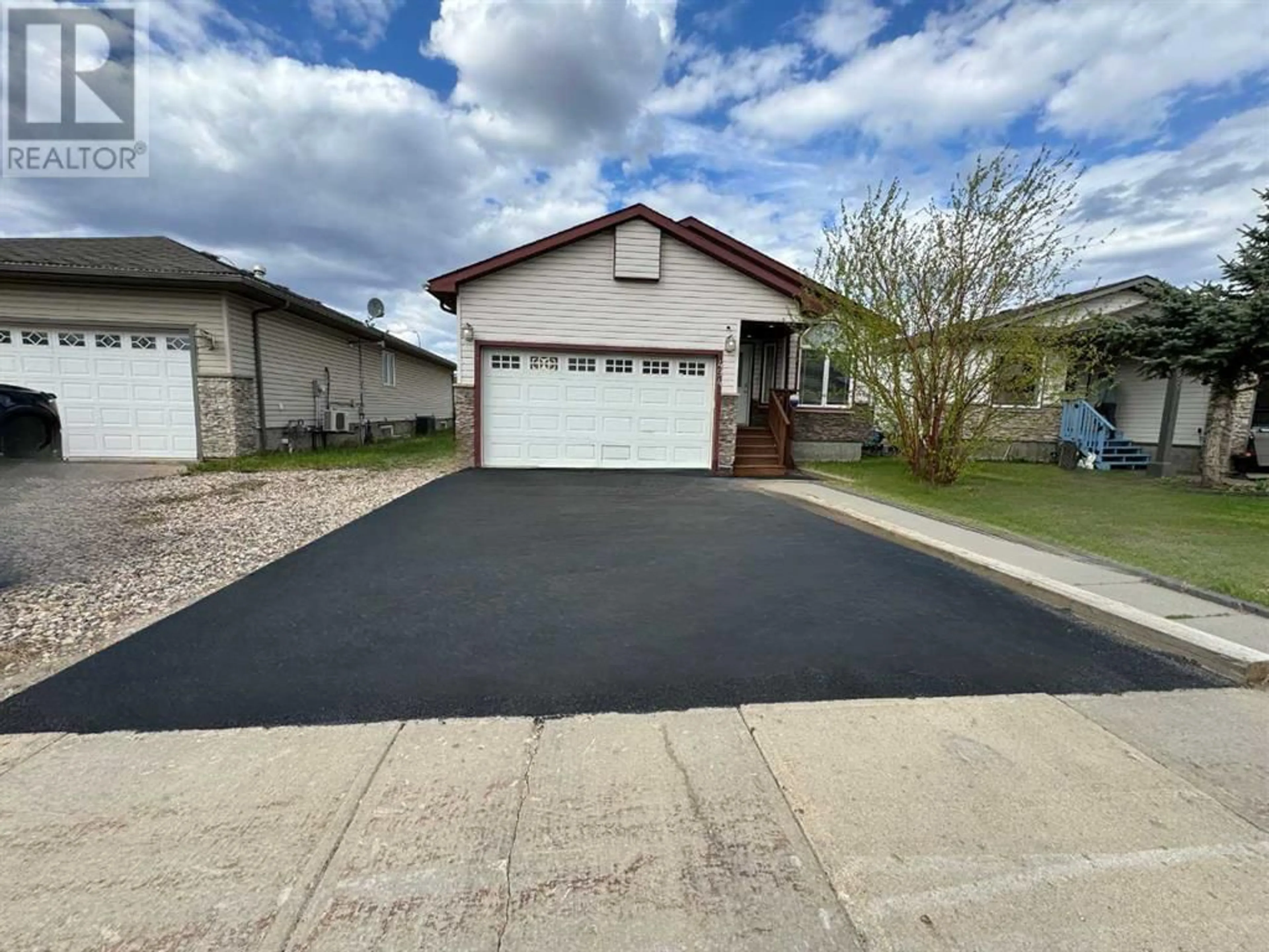 Frontside or backside of a home for 494 Pacific Crescent, Fort McMurray Alberta T9K0E4