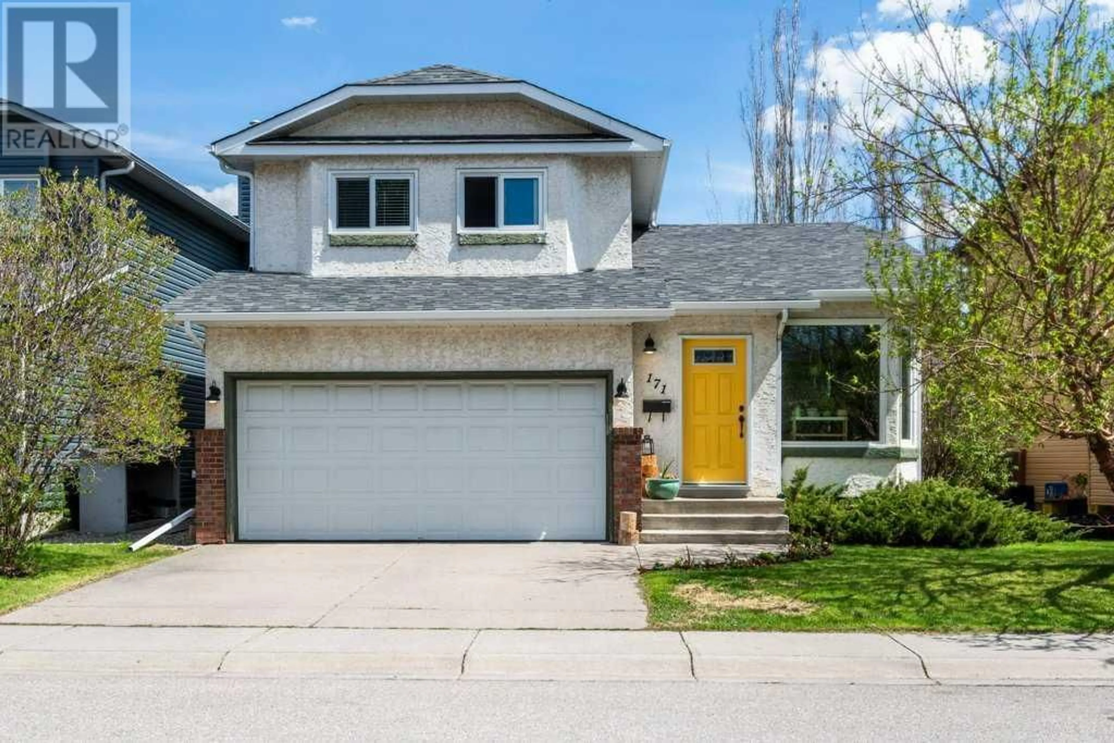 Frontside or backside of a home for 171 Riverbrook Way SE, Calgary Alberta T2C3S7