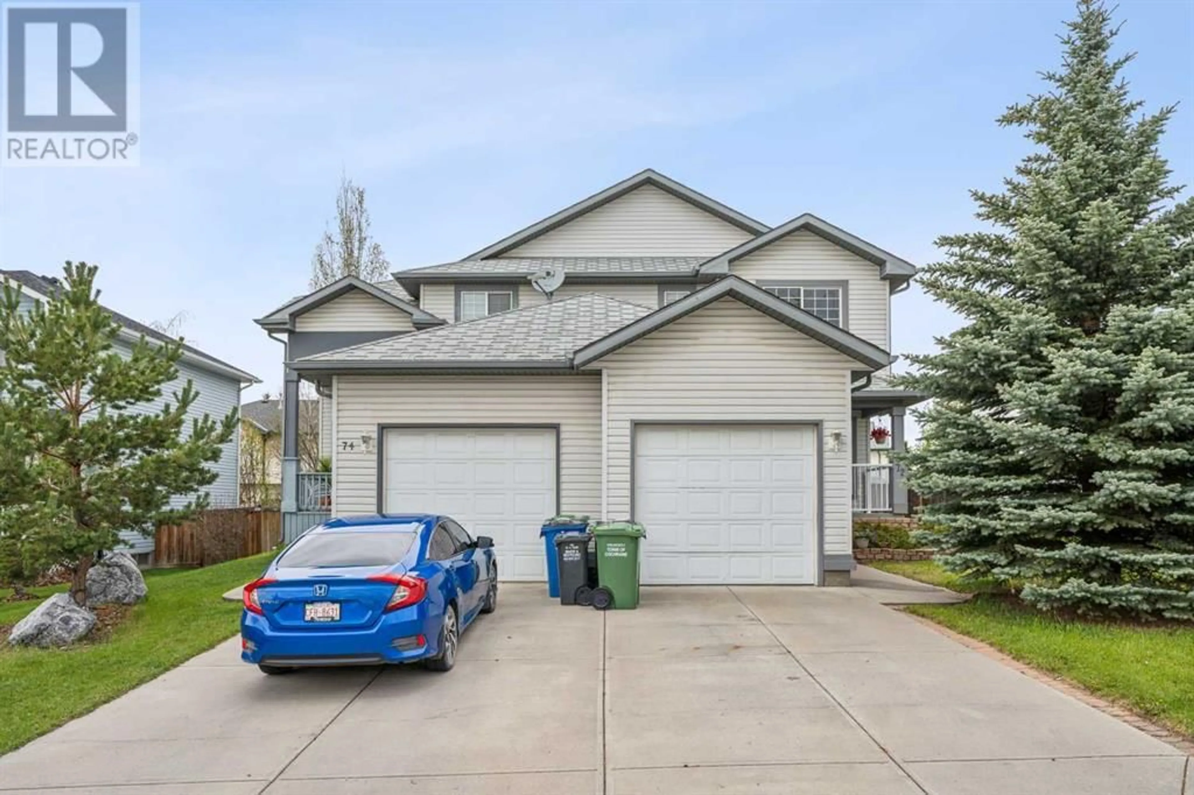 Frontside or backside of a home for 72 West Terrace Road, Cochrane Alberta T4C1S5
