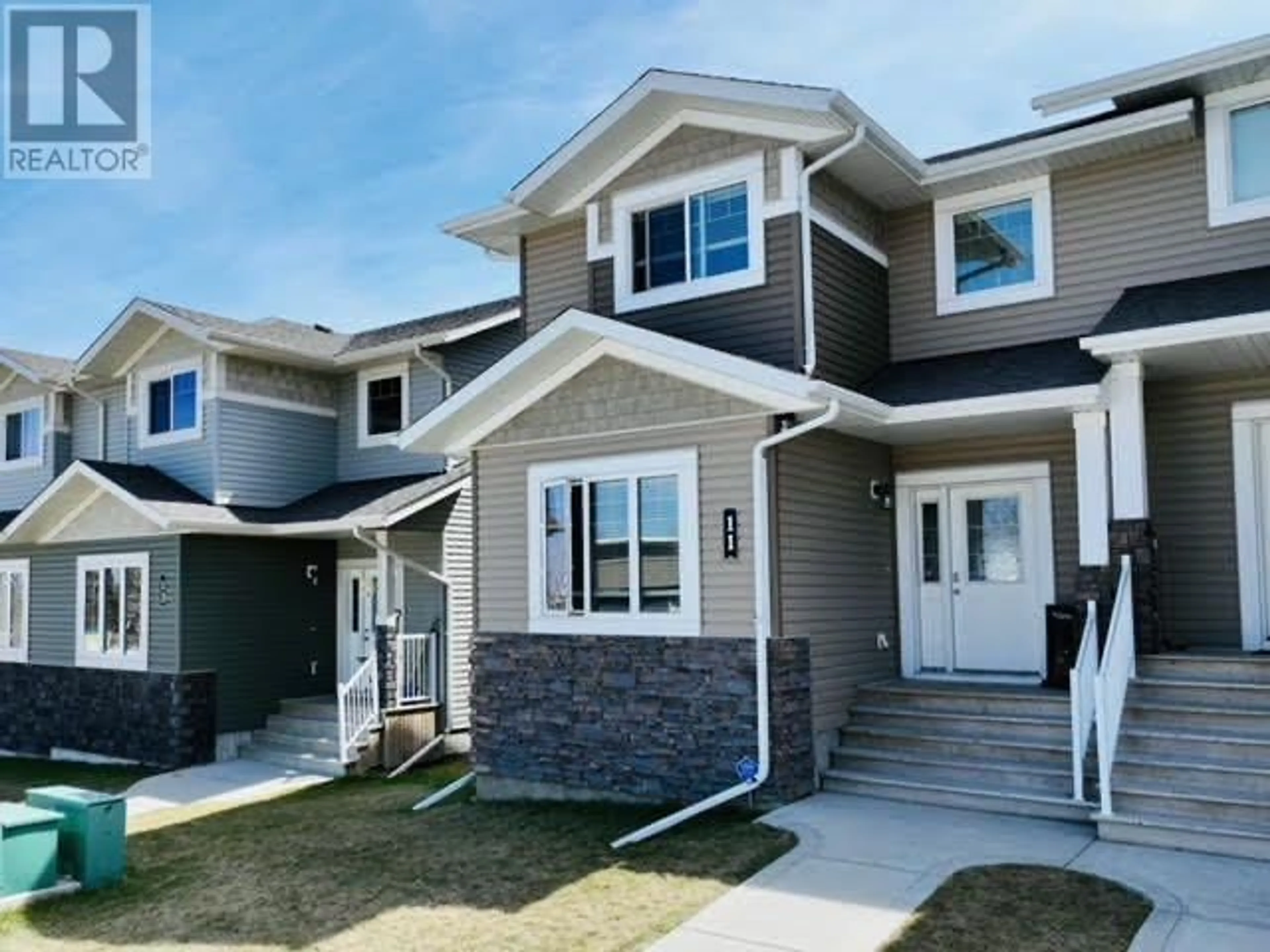 A pic from exterior of the house or condo for 11 Crestview Boulevard, Sylvan Lake Alberta T4S0N4