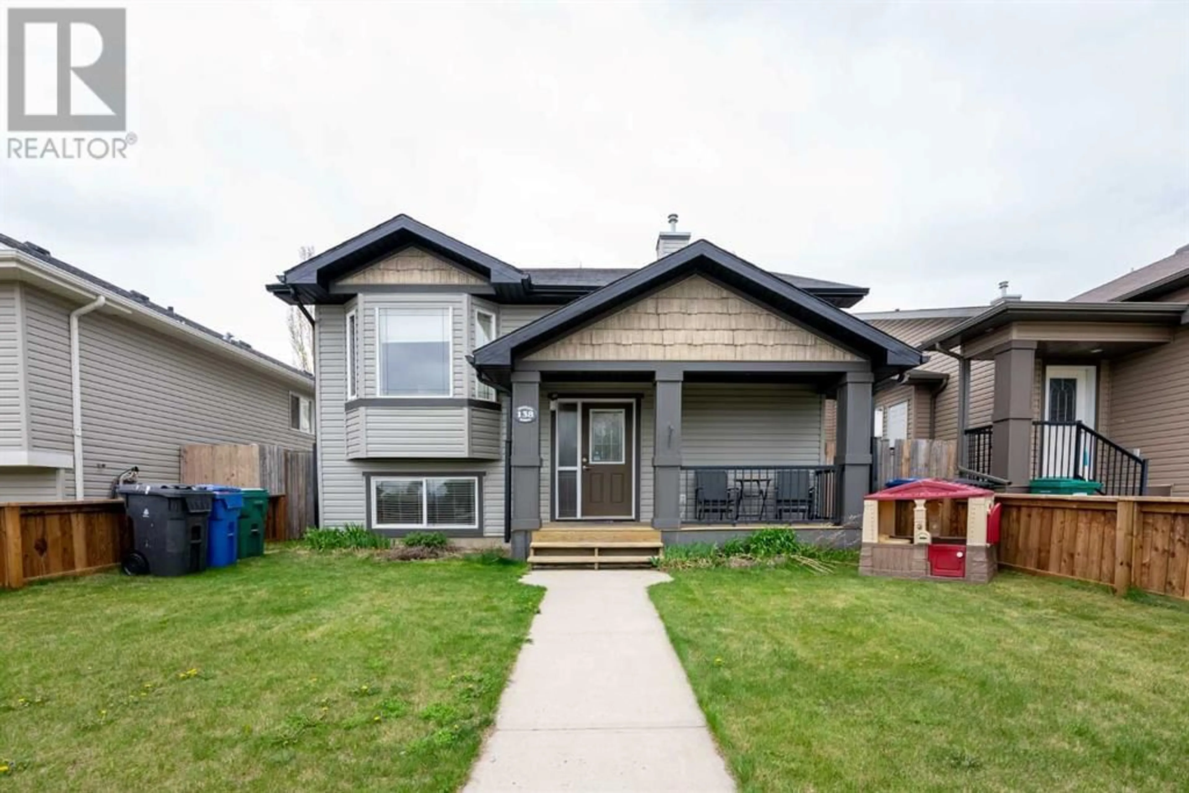 Frontside or backside of a home for 138 Silkstone Road W, Lethbridge Alberta T1J2G3