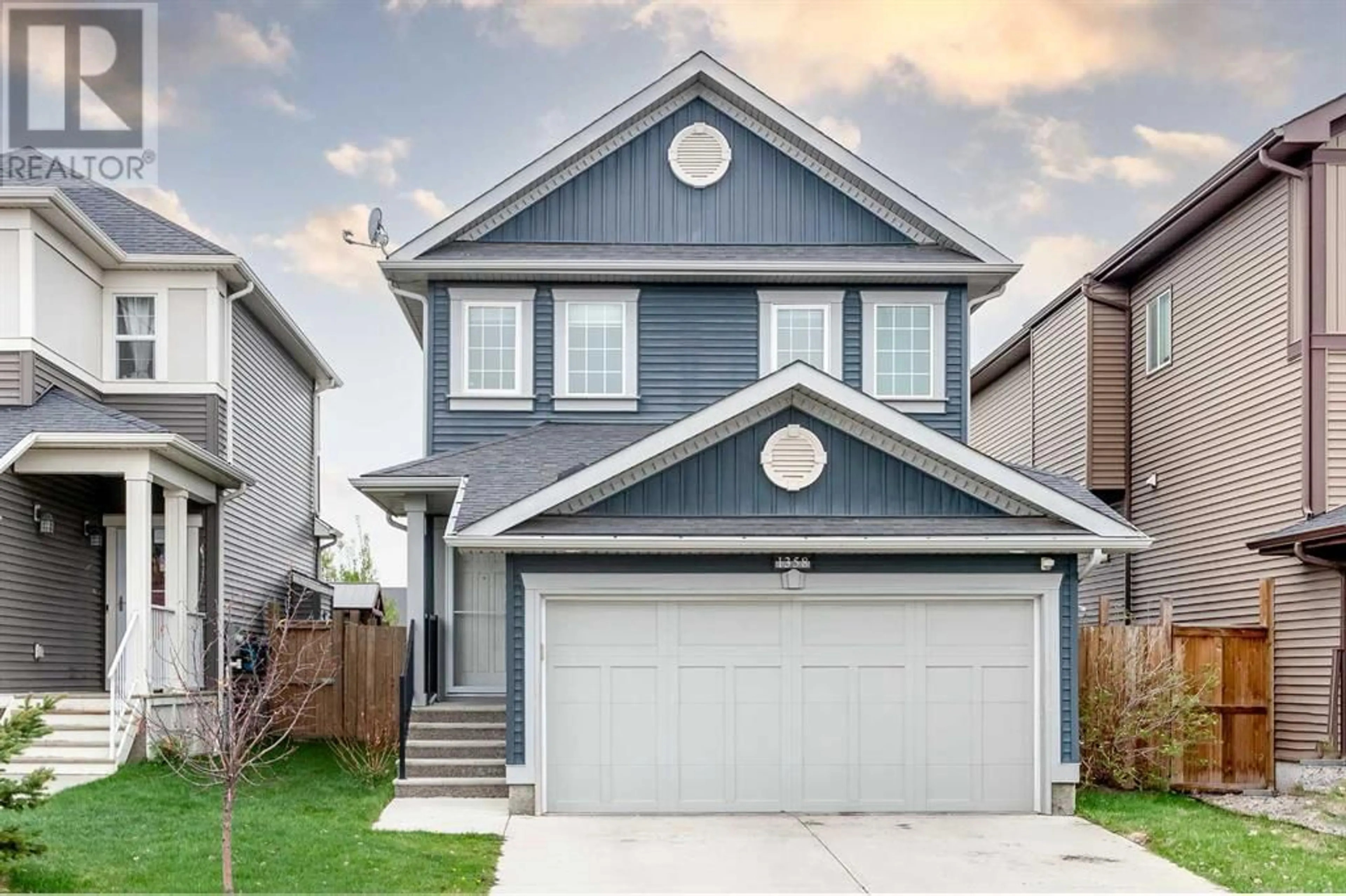 Frontside or backside of a home for 1358 Kings Heights Way SE, Airdrie Alberta T4A0R9
