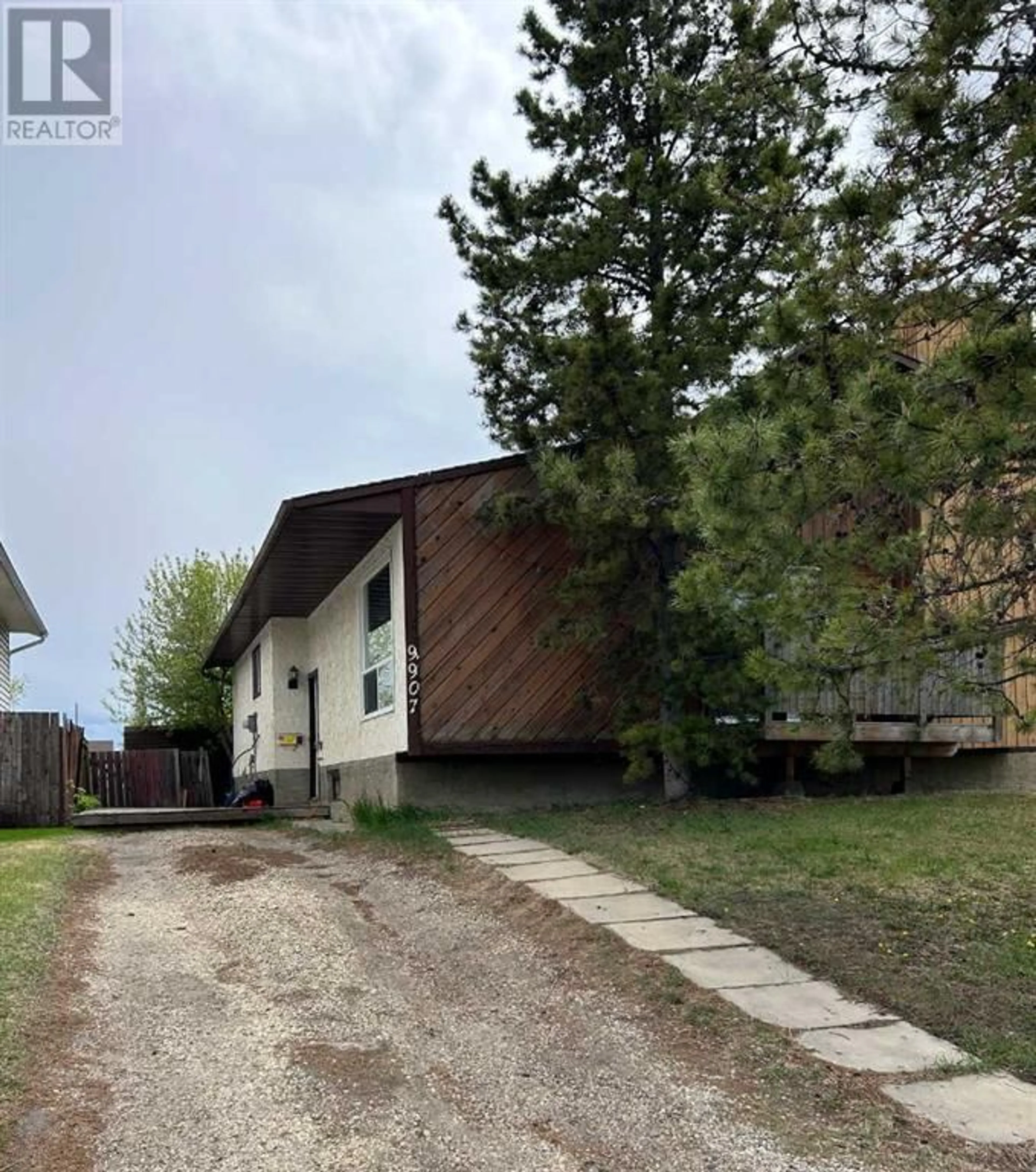 Frontside or backside of a home for 9907 69 Avenue, Grande Prairie Alberta T8V5G3