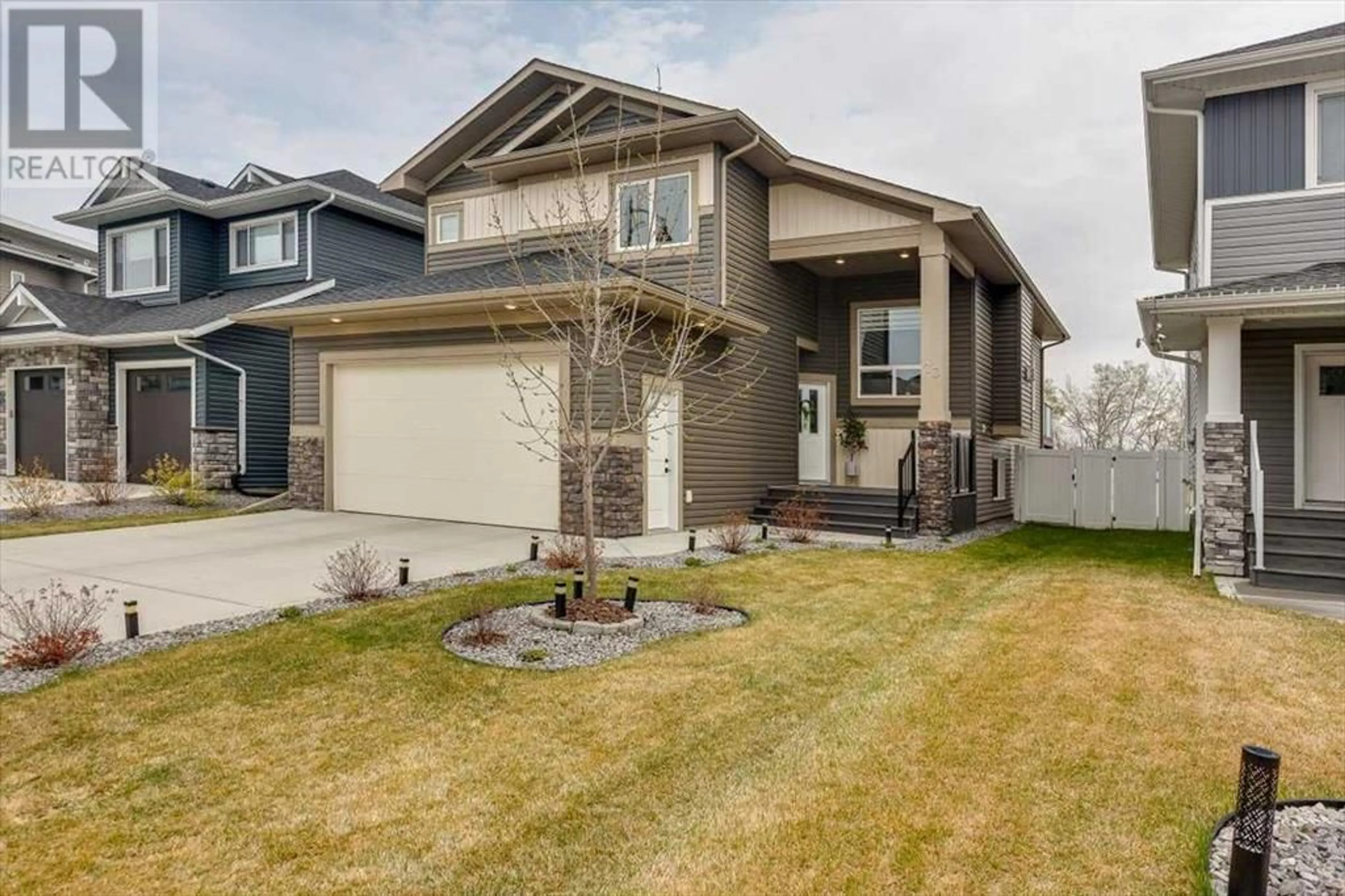 Frontside or backside of a home for 73 Longmire Close, Red Deer Alberta T4R0T1