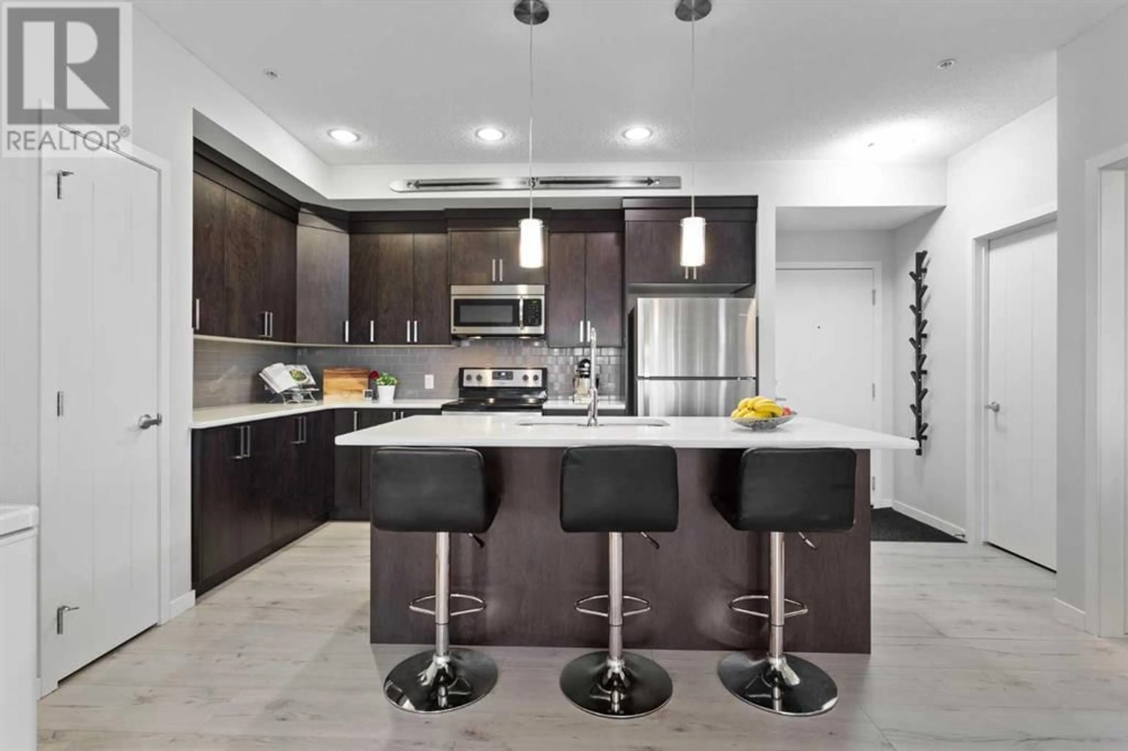 Contemporary kitchen for 110 6603 New Brighton Avenue SE, Calgary Alberta T2Z5E5