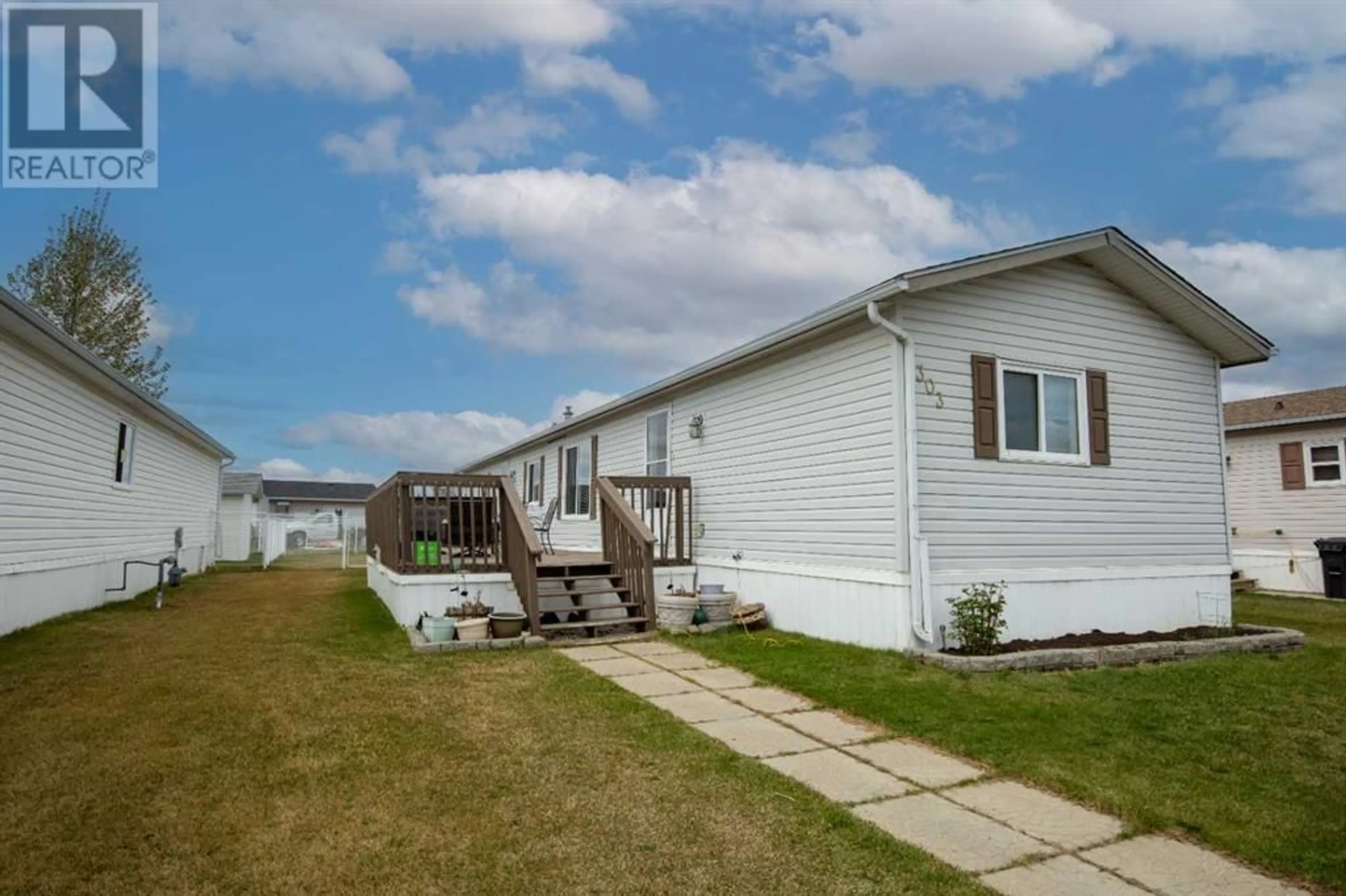 A pic from exterior of the house or condo for 303  Scott Lane, Rural Grande Prairie No. 1, County of Alberta T8W5K5